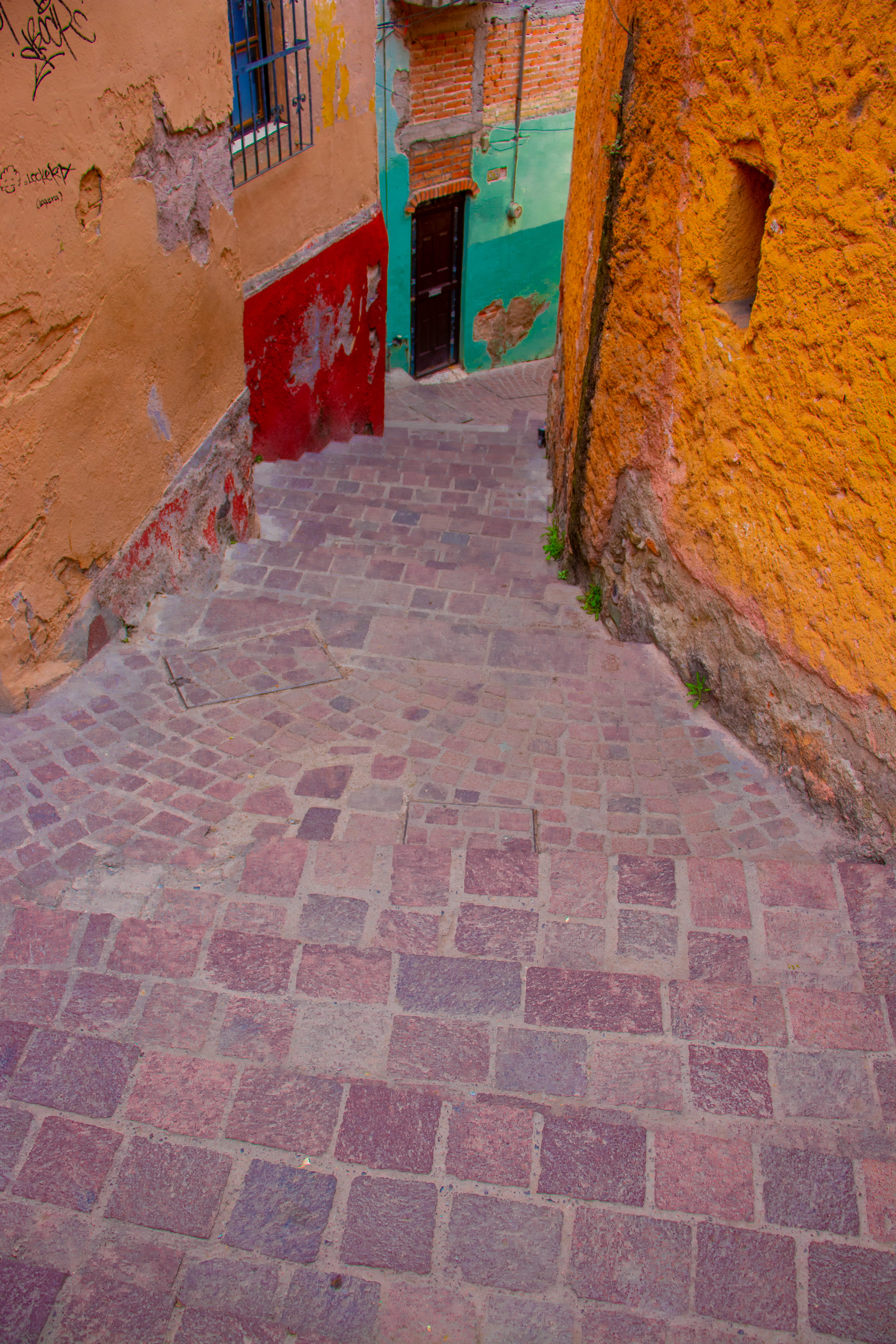 mexico, city, brick, wall, multi colored, building, orange, 5K, alley, day, footpath, pattern, architecture, guanajuato, old, building exterior, the way forward, Phone HD Wallpaper