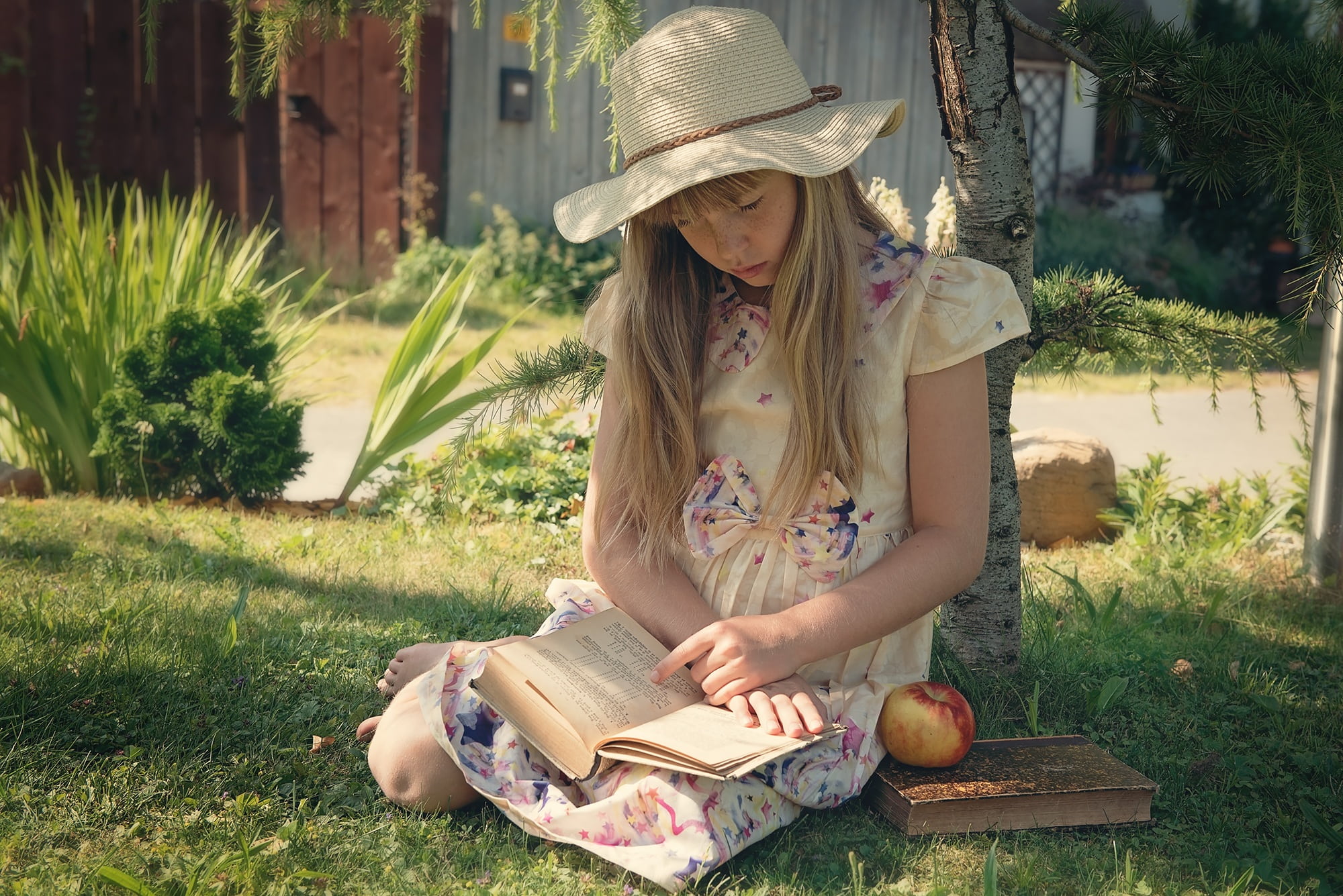 summer, holding, yellow, meadow, girl, floral, real people, girls, reading, absorbed, nature, learn, hairstyle, women, grass, out, sunhat, front view, dress, HD Wallpaper