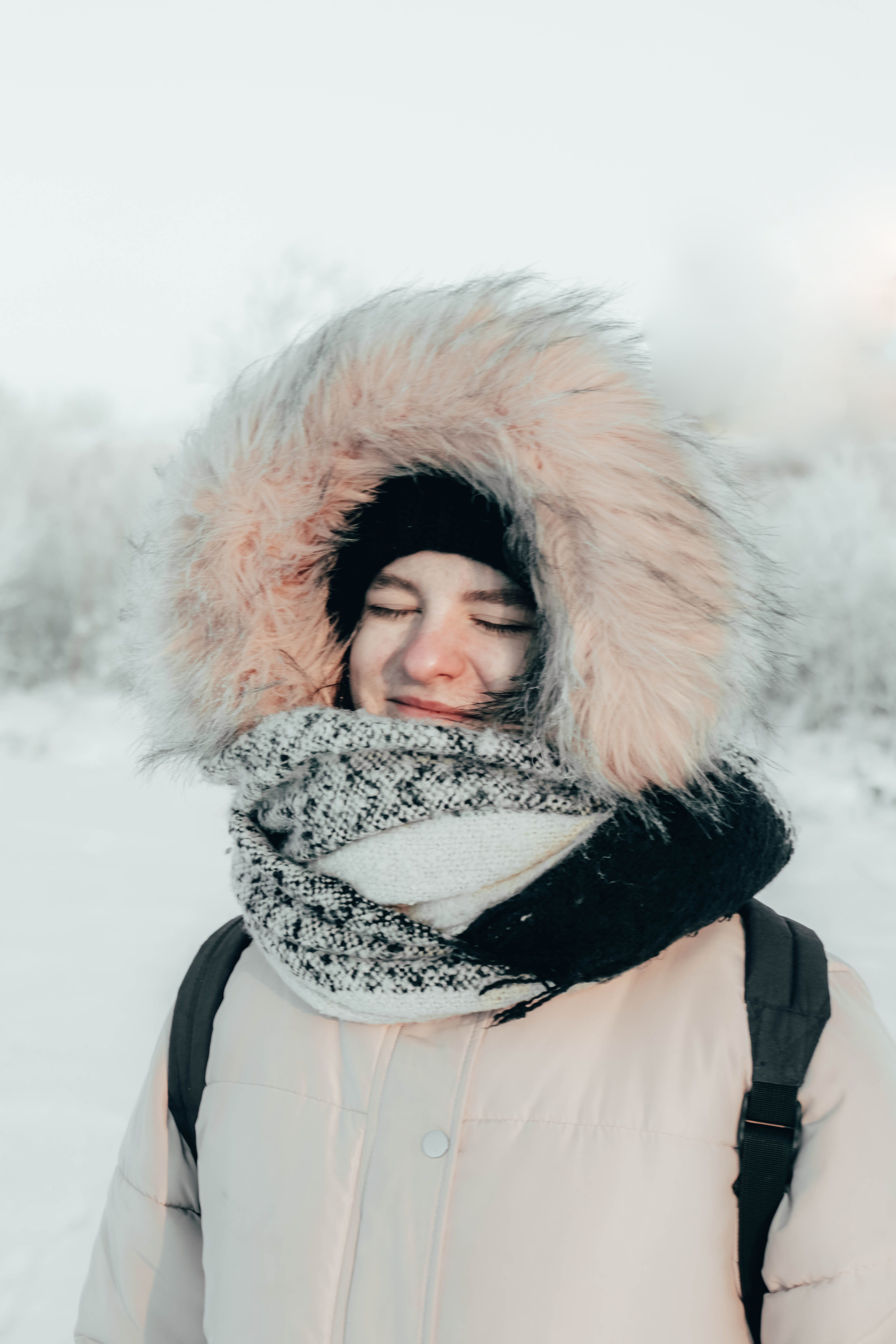 one person, coat, looking at camera, finger, jacket, nature, snow, human, extreme weather, cold temperature, person, hood, helmet, winter, beautiful woman, Phone HD Wallpaper