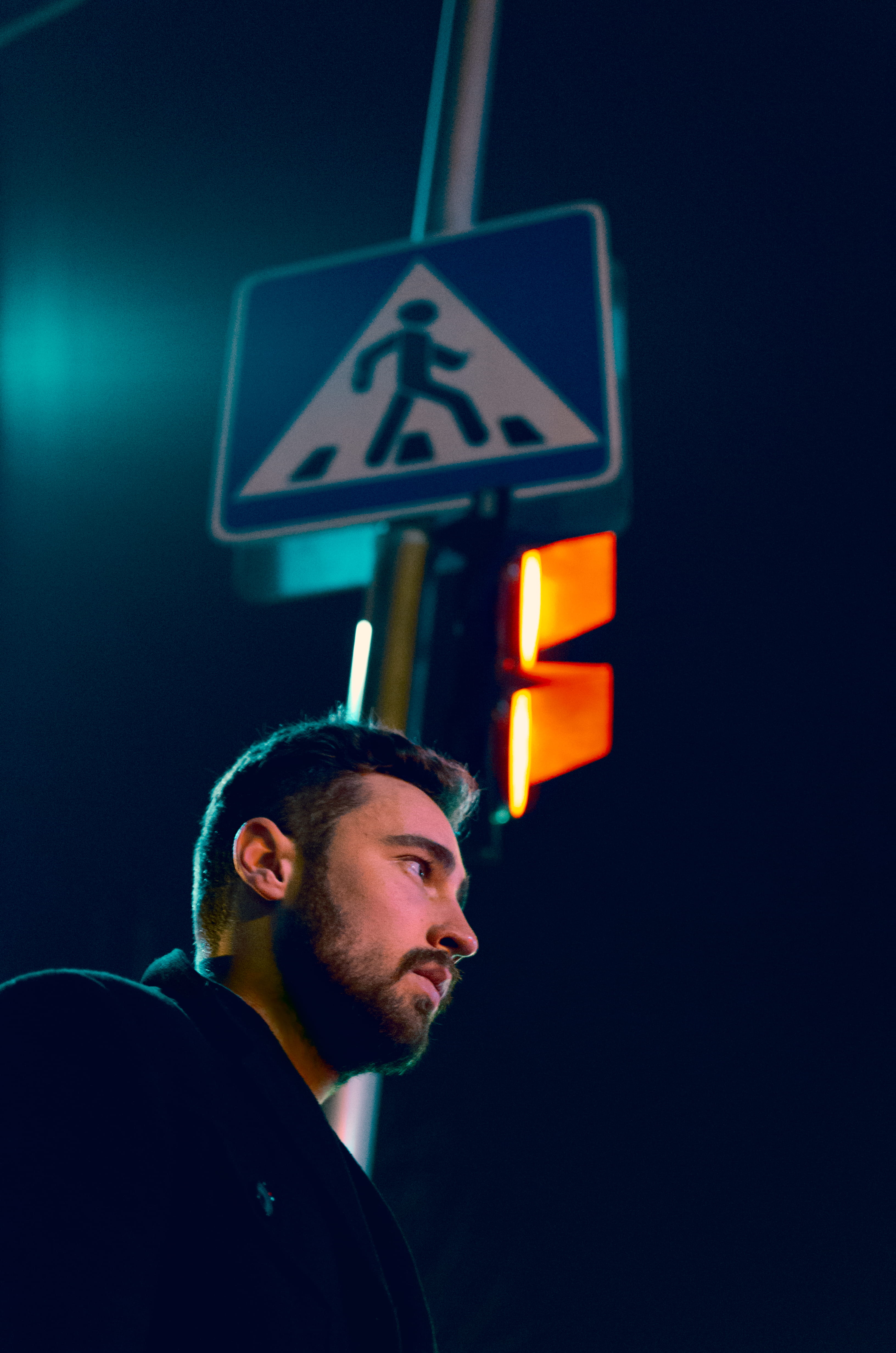 person, hair, guidance, pedestrian, men, human, neon, beard, standing, one person, symbol, man, road sign, young men, communication, illuminated, headshot, Phone HD Wallpaper