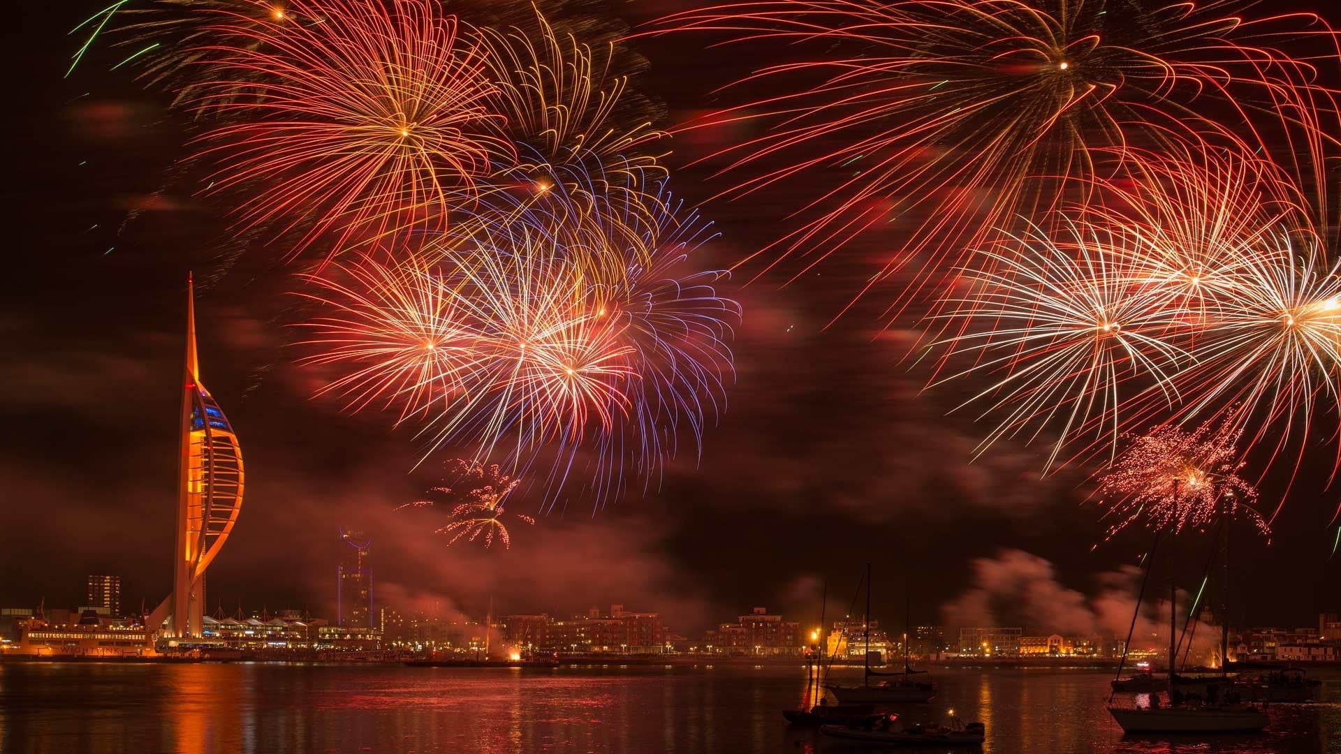 outdoors, firework display, event, no people, night, portsmouth, skyscraper, fireworks, cityscape, water, sparks, illuminated, built structure, europe, HD Wallpaper