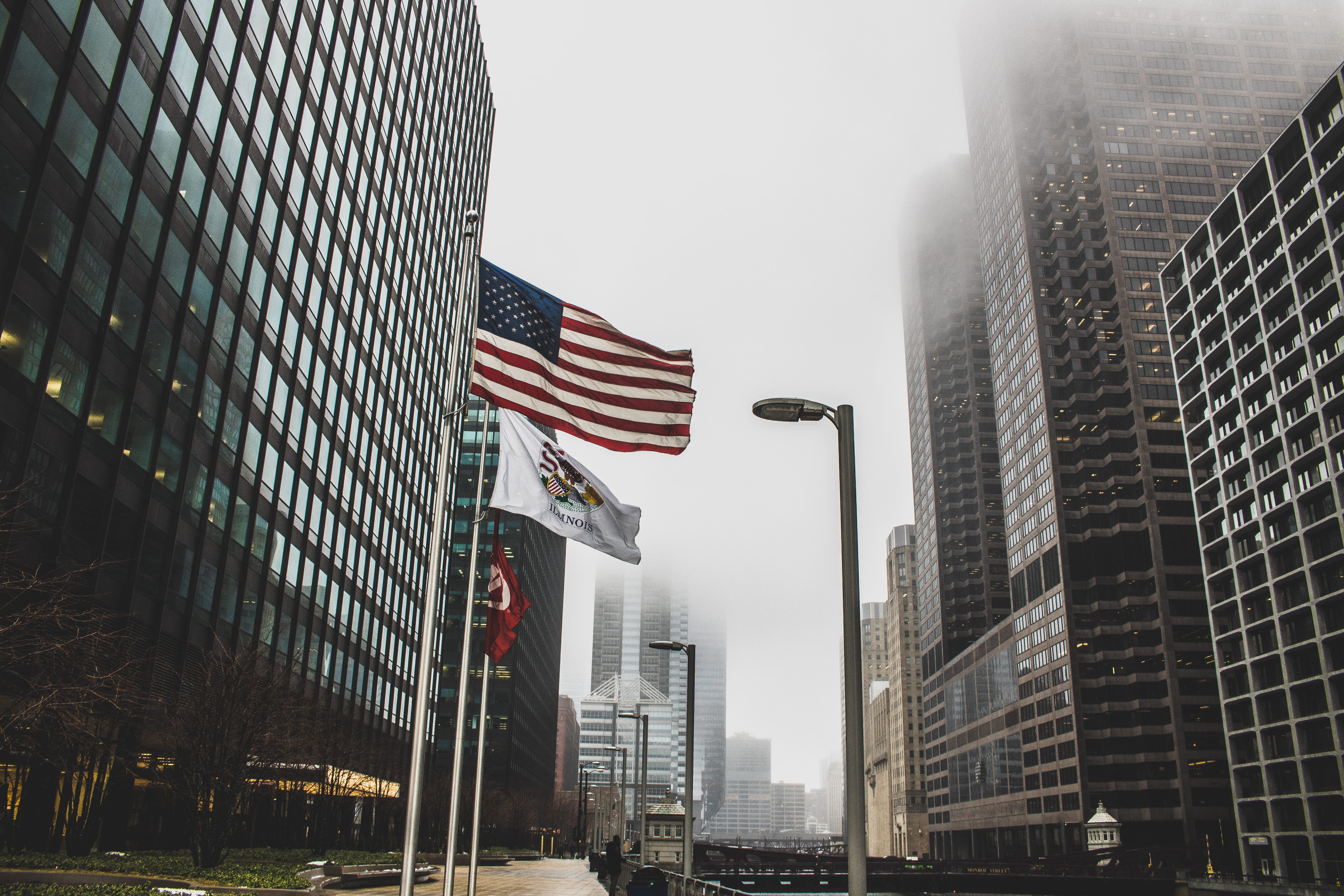 low angle view, cityscape, windows, corporate, flag, low angle shot, financial district, outdoors, downtown, fog, tall - high, travel destinations, architectural design, HD Wallpaper