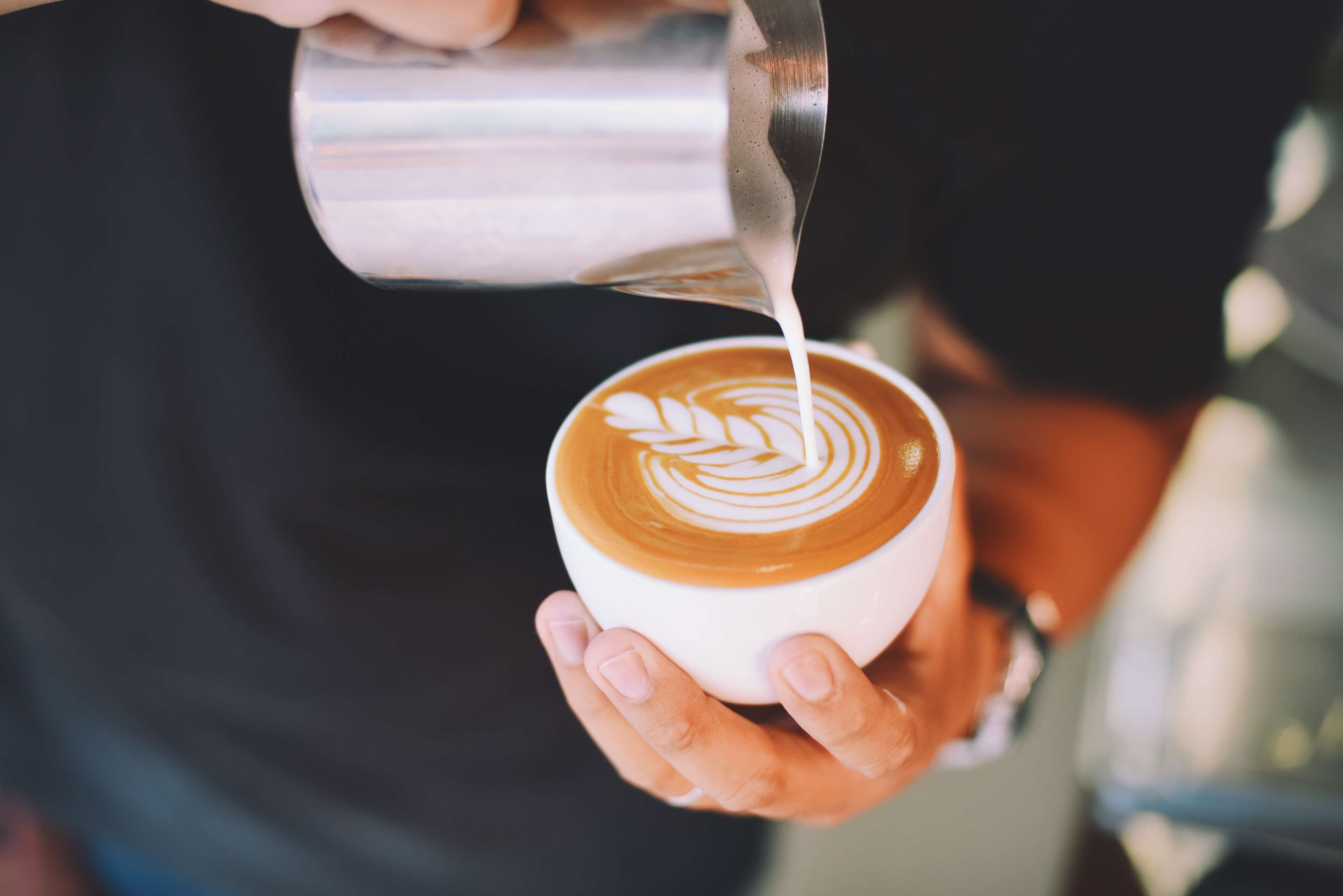 focus on foreground, food and drink, caffeine, cafe, espresso, holding, design, blur, people, indoors, cup, beverage, hot drink, 4K, refreshment, breakfast, HD Wallpaper