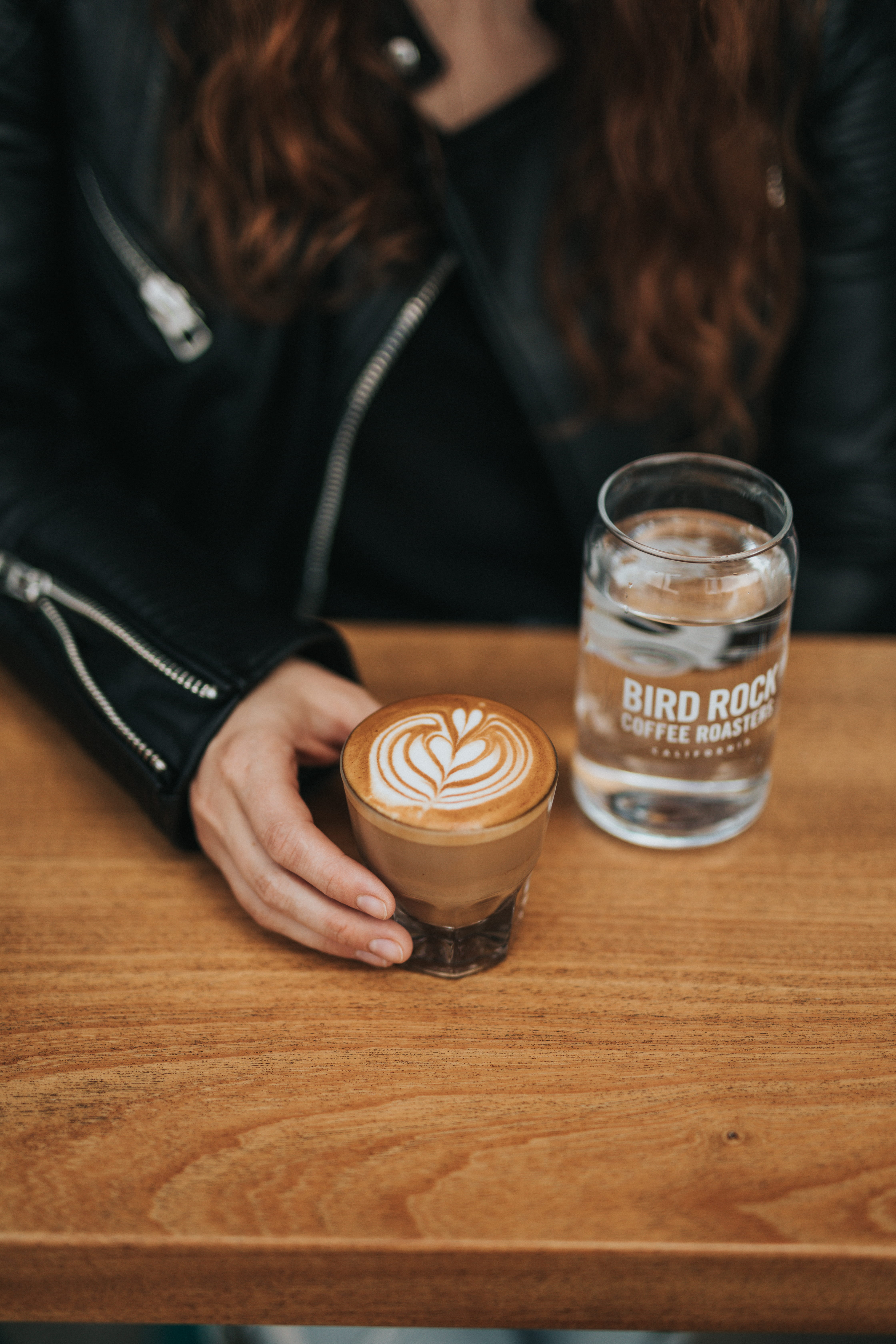 coffee - drink, coffee lover, coffee fiend, latte art, cappuccino, wooden table, hairstyle, mocha, beside, one person, coffee roaster, hand, person, macchiato, Phone HD Wallpaper