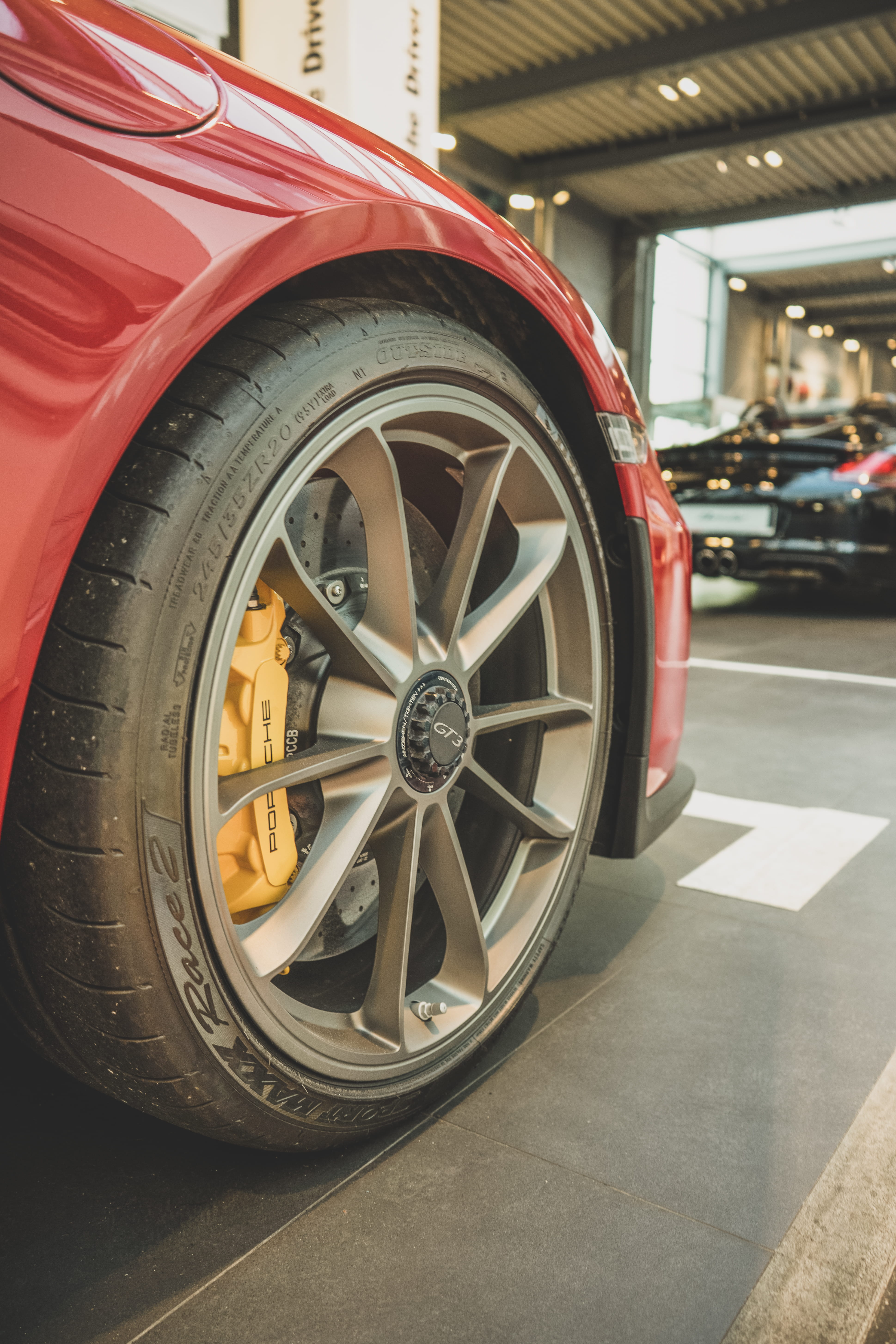 latte, red, hubcap, 5K, automobile, machine, focus on foreground, indoors, luxury, mode of transportation, day, transportation, coffee cup, cup, spoke, Phone HD Wallpaper