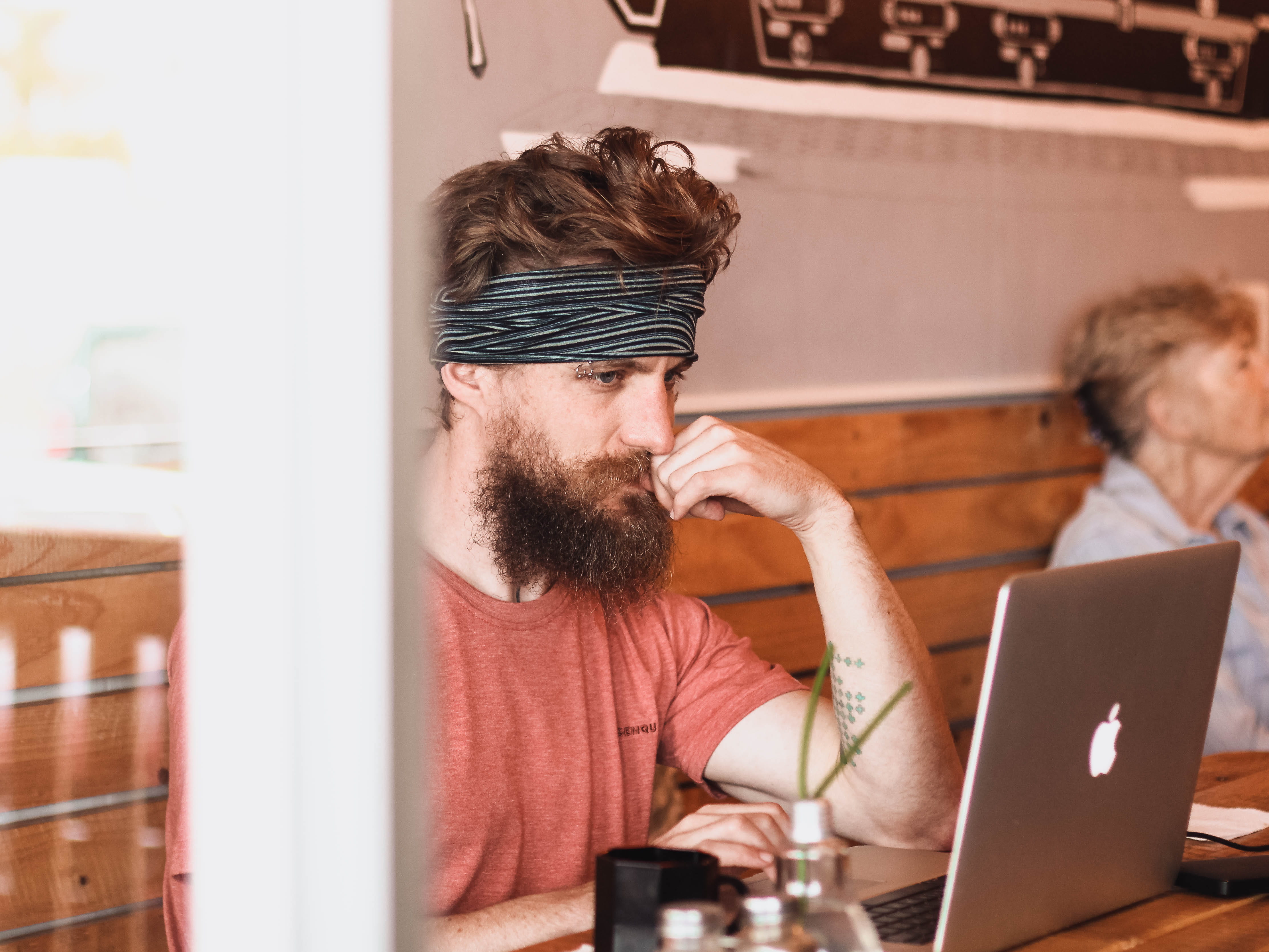 male, focusing, cafe, work, facial hair, wireless technology, tattoo, using laptop, sitting, office, casual clothing, indoors, working, men, adult, hipster - person, HD Wallpaper