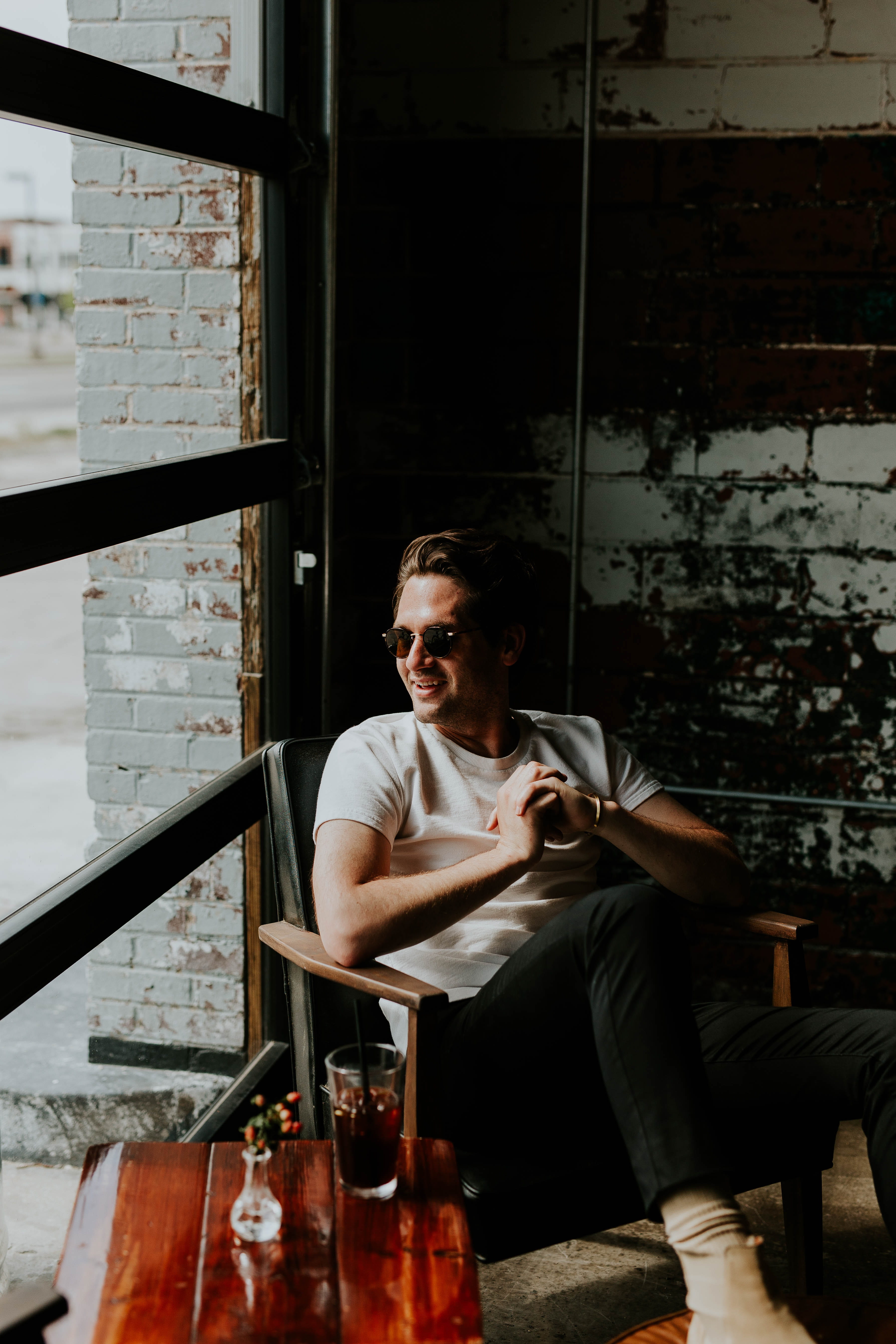 coffee shop, front view, person, refreshment, lifestyles, men, fashion, happy, laugh, coffee, young men, sitting, one person, holding, people, alcohol, Phone HD Wallpaper