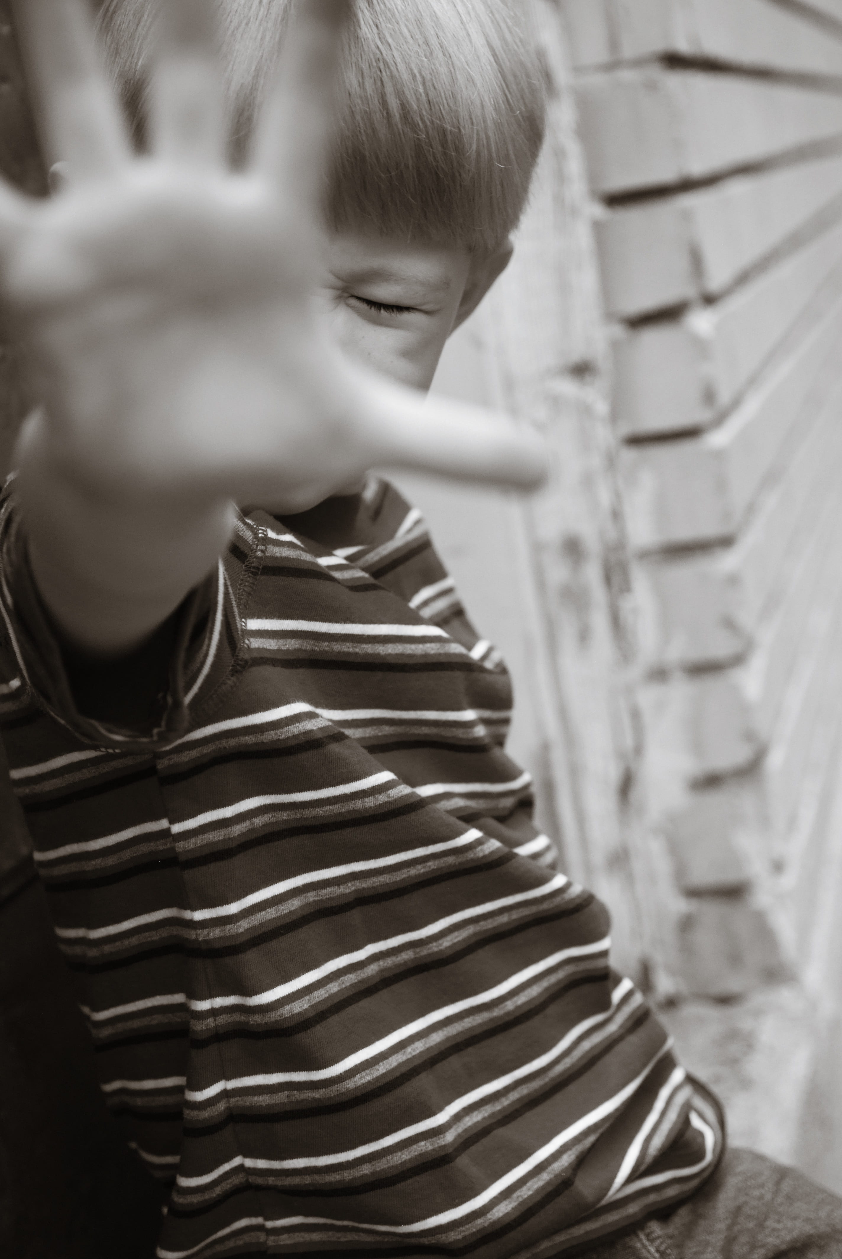 men, selective focus, standing, architecture, covering, boys, wall, person, girls, photography, leisure activity, defiant, brick, stop, stop bullying, boy, Phone HD Wallpaper