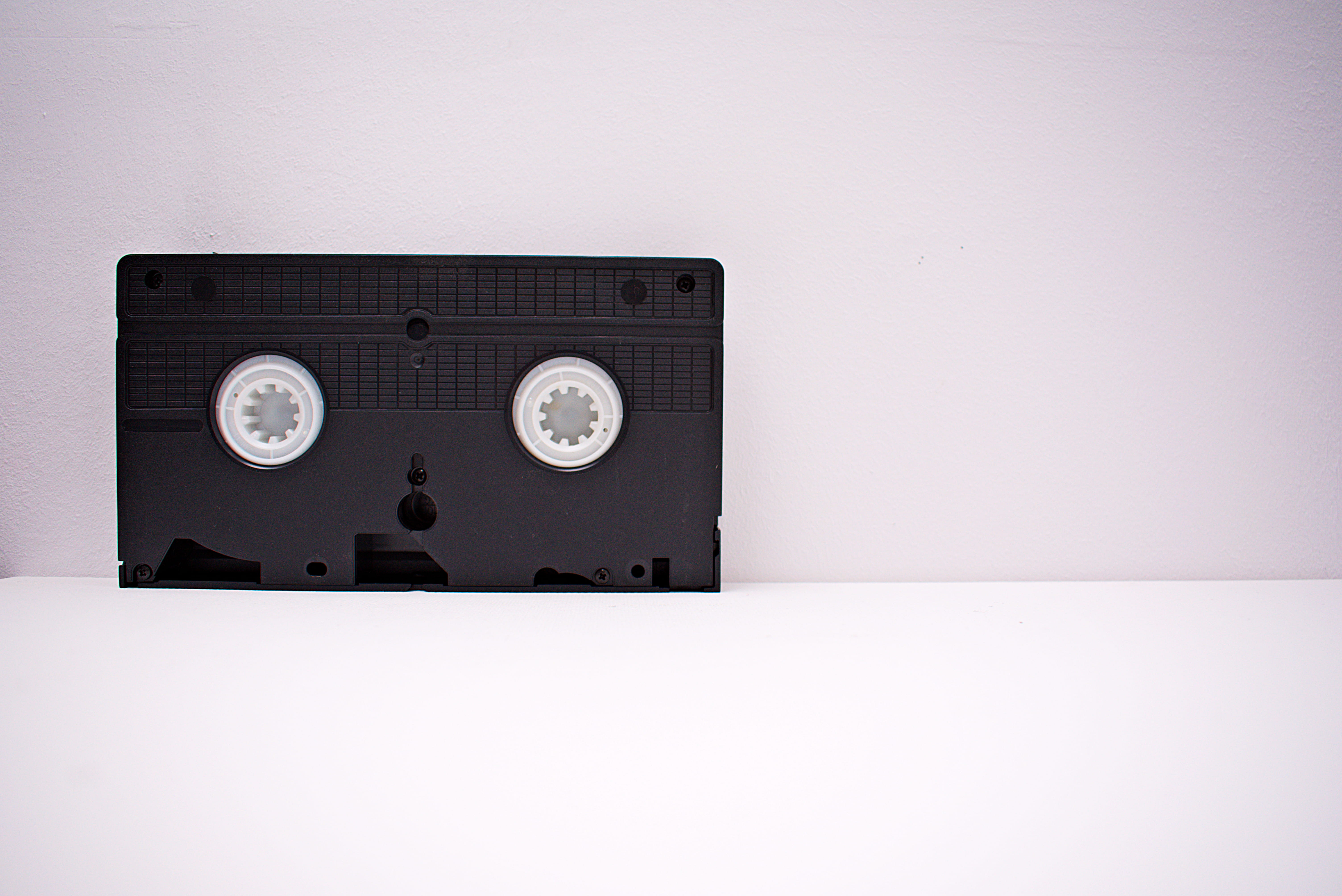 video recording, surface, vhs, cut out, videotape, power supply, no people, wooden, audio equipment, equipment, electrical equipment, wall - building feature, HD Wallpaper