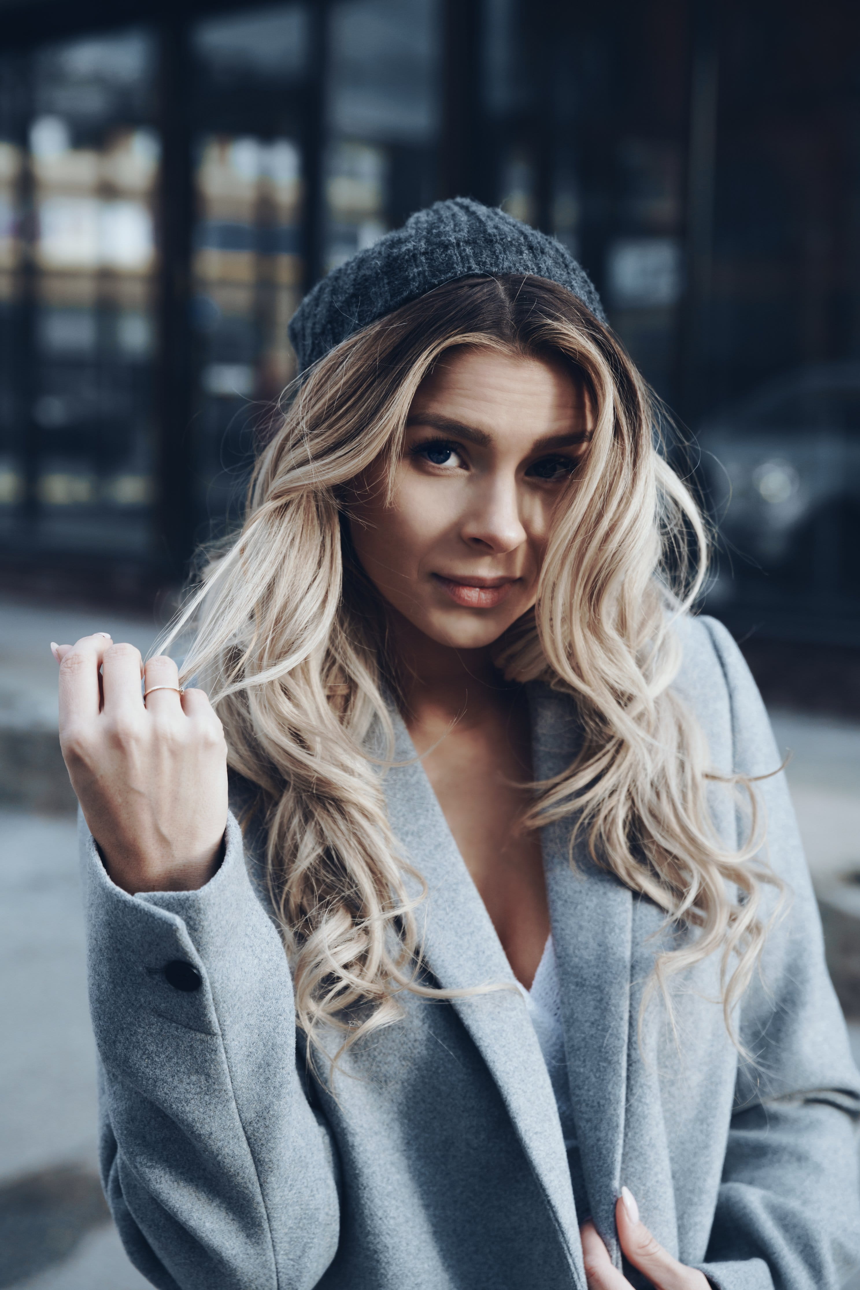 batting, City, waist up, Fashion, Portraits, portrait, hair, long hair, Emotion, 4K, beautiful woman, twirling, focus on foreground, hairstyle, Women, Phone HD Wallpaper