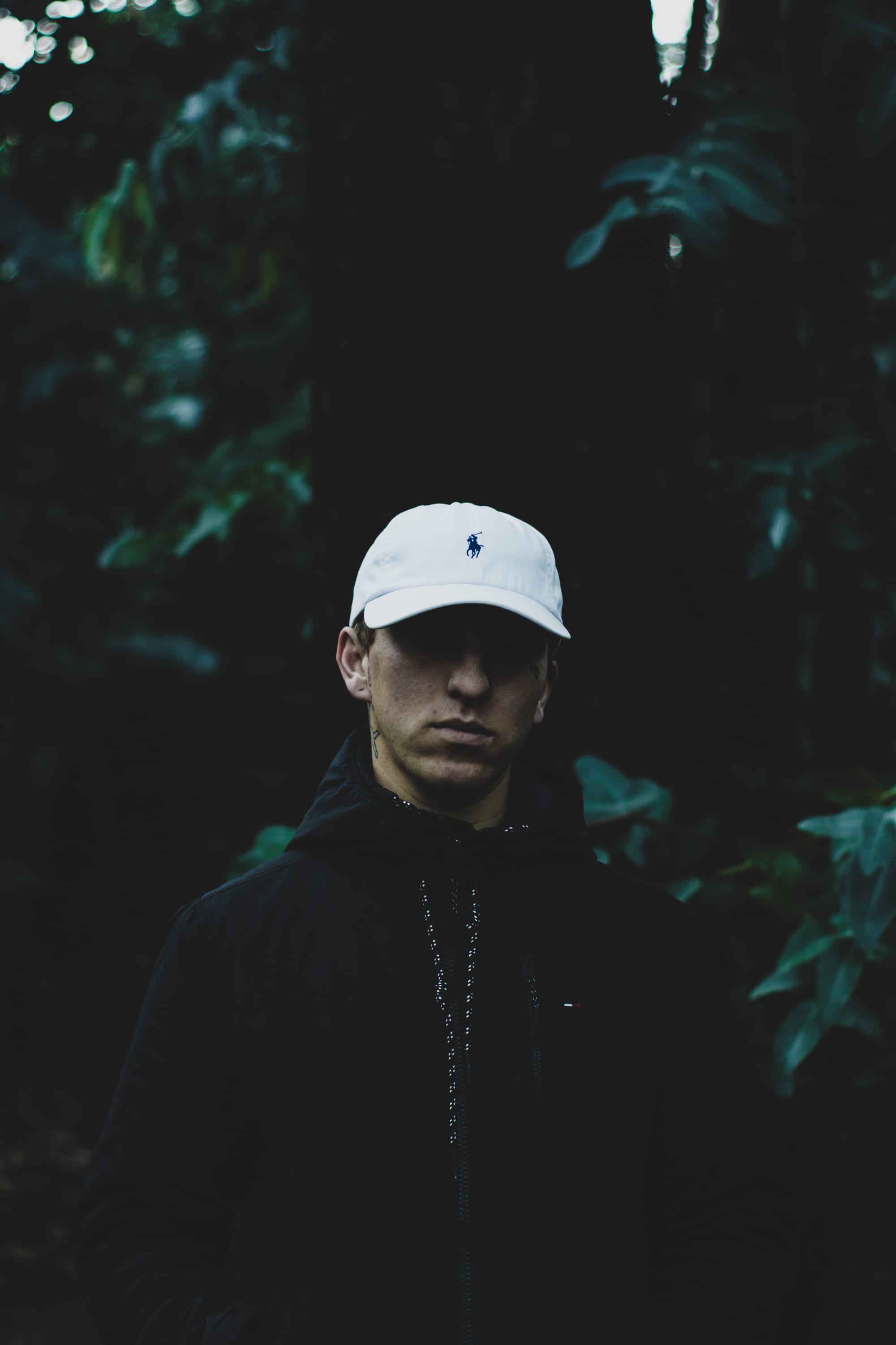 real people, portrait, young, male, jacket, hat, tattoo, young men, mid adult, lifestyles, standing, polo, leisure activity, green contrast, 2K, serious, Phone HD Wallpaper