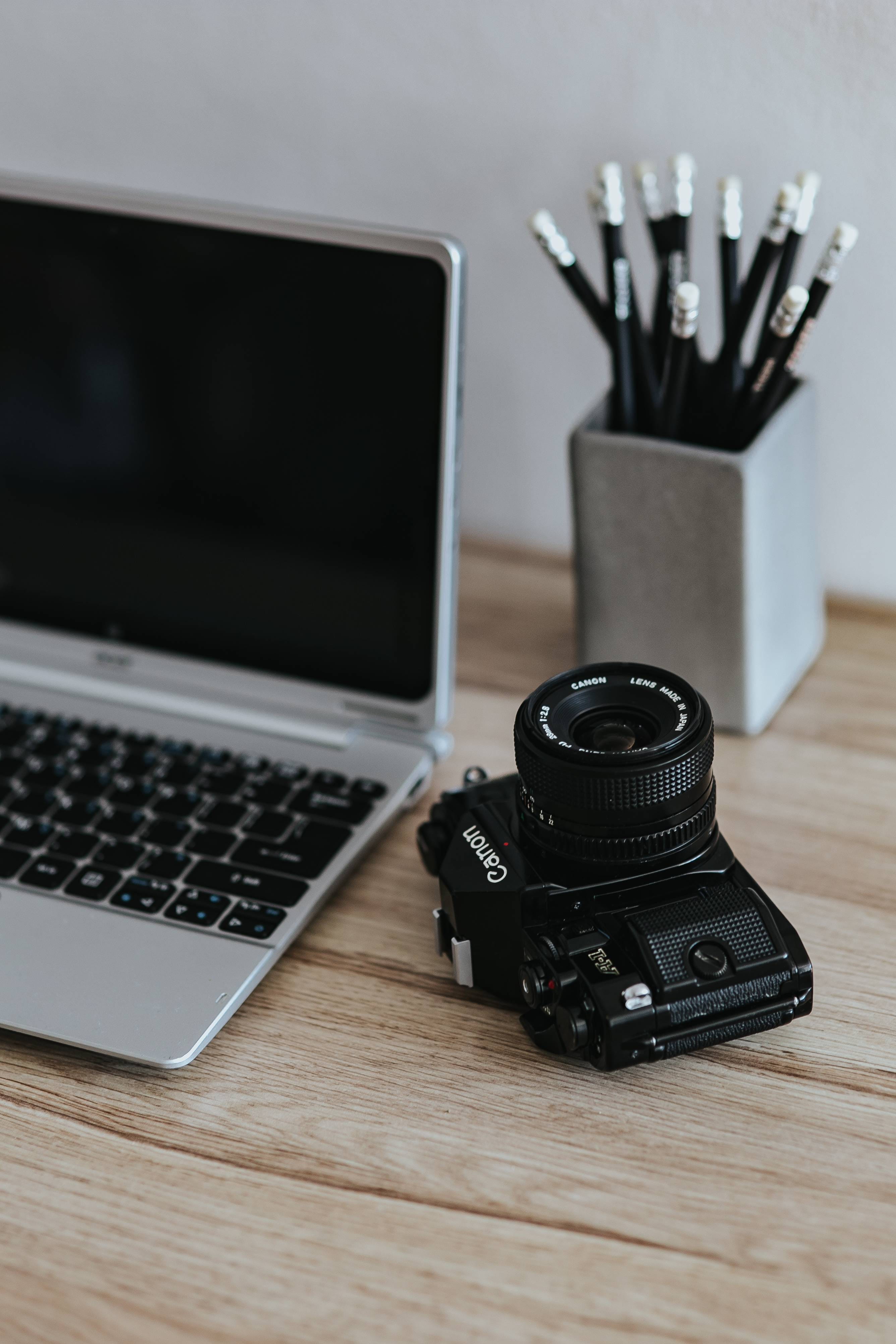 black, photographic equipment, connection, laptop, camera, notebook, communication, silver, white, wood - Material, keys, photography themes, 4K, lens - optical instrument, Phone HD Wallpaper