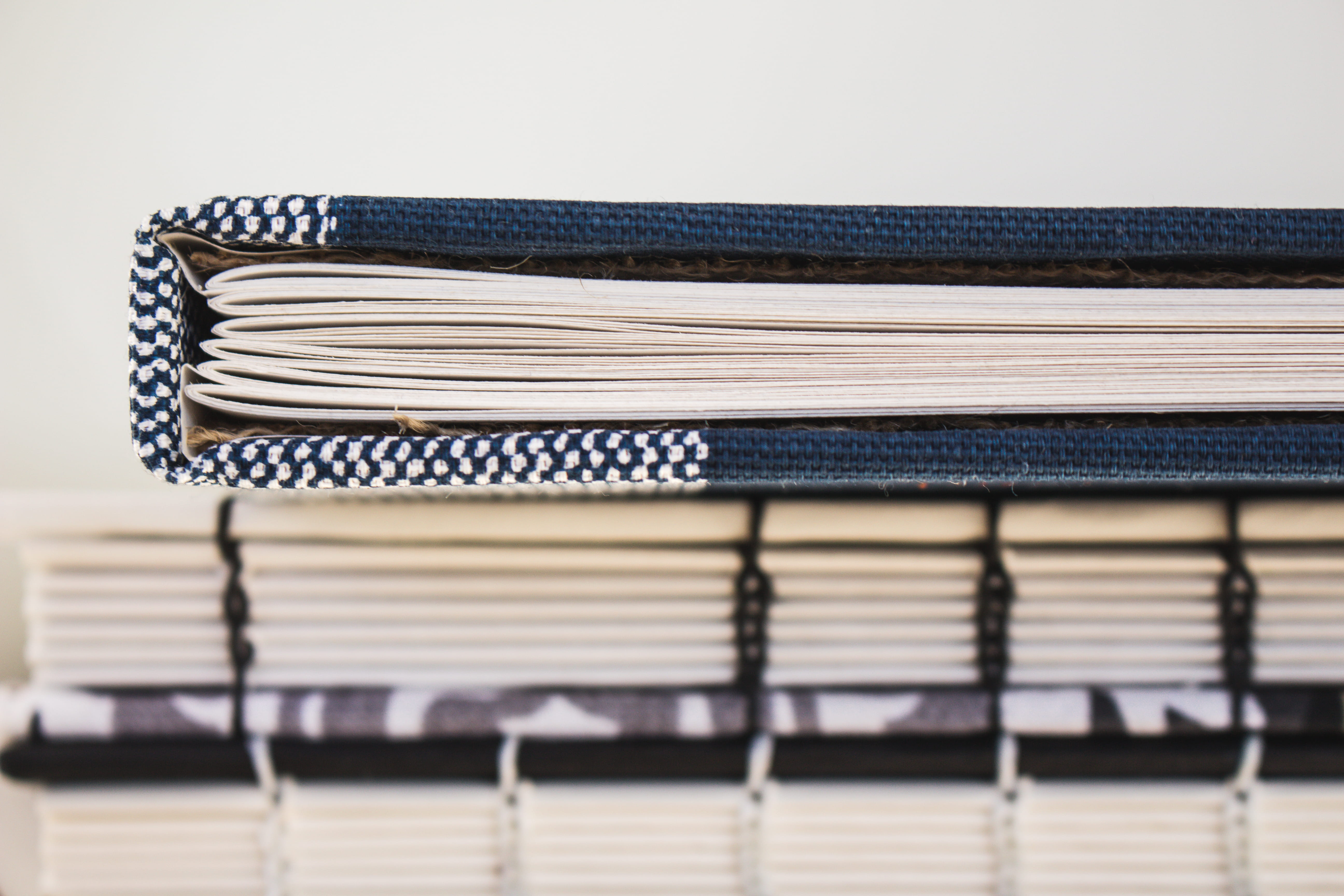 arrangement, focus on foreground, hand stitched, folded, minimal, order, large group of objects, striped, textile, indoors, close-up, book stack, bookbinding, HD Wallpaper