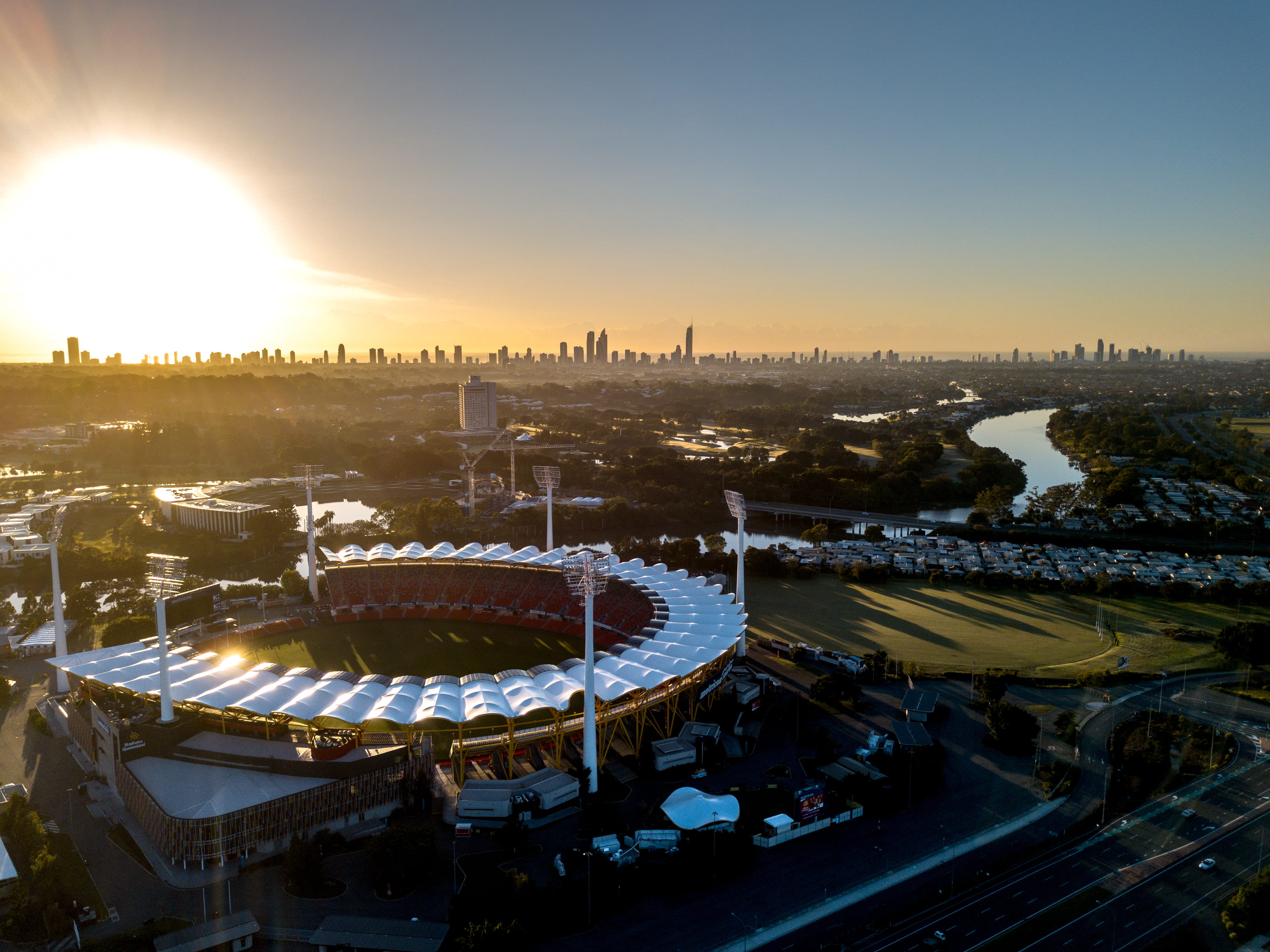 australia, sunset, architecture, commonwealth games, cityscape, games, amusement park ride, high angle view, lens flare, transportation, sunlight, nature, HD Wallpaper