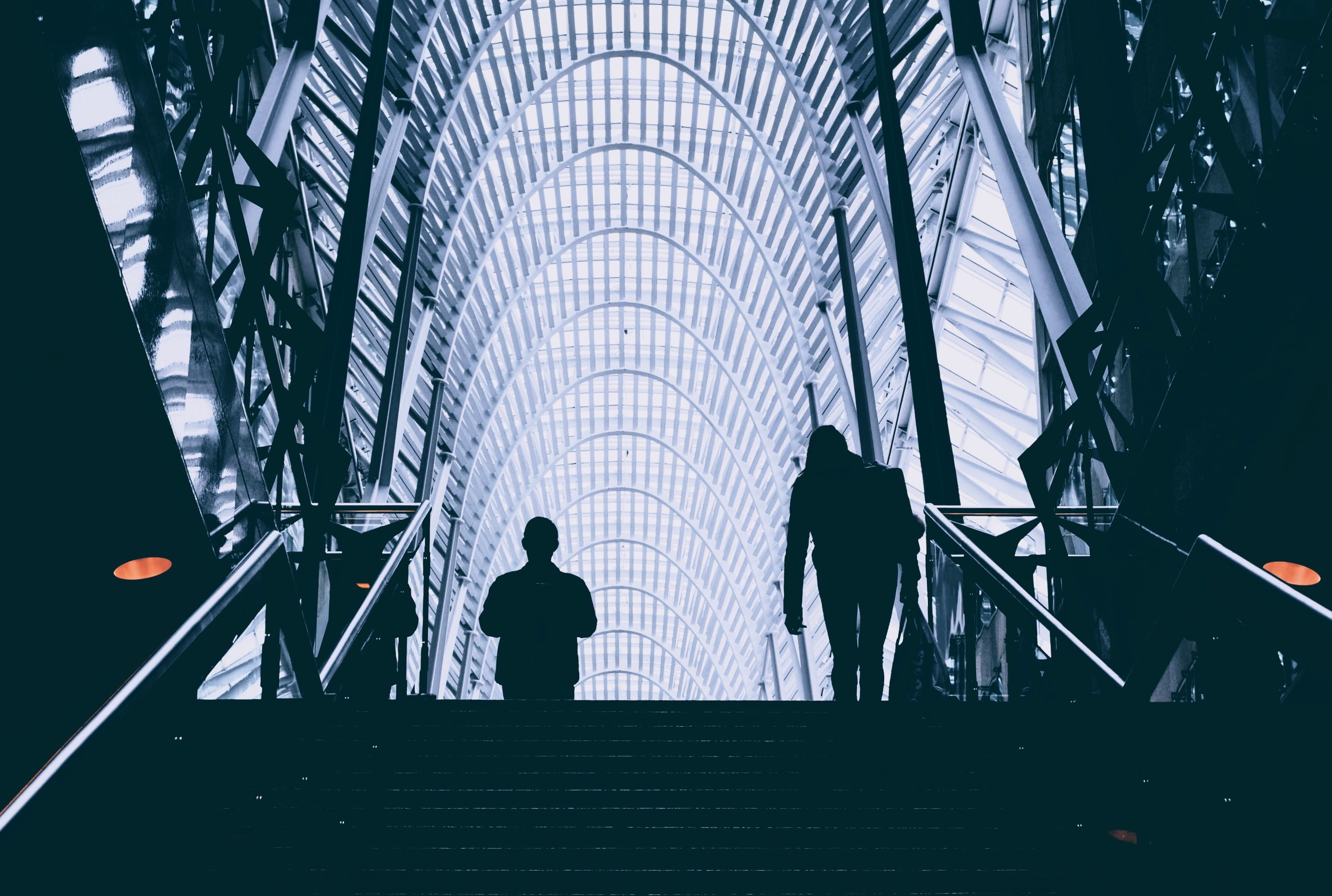 steel, steps, indoors, people, light, stair, airport, real people, man, railings, glass, building, leisure activity, 2K, men, reflection, city, built structure, HD Wallpaper