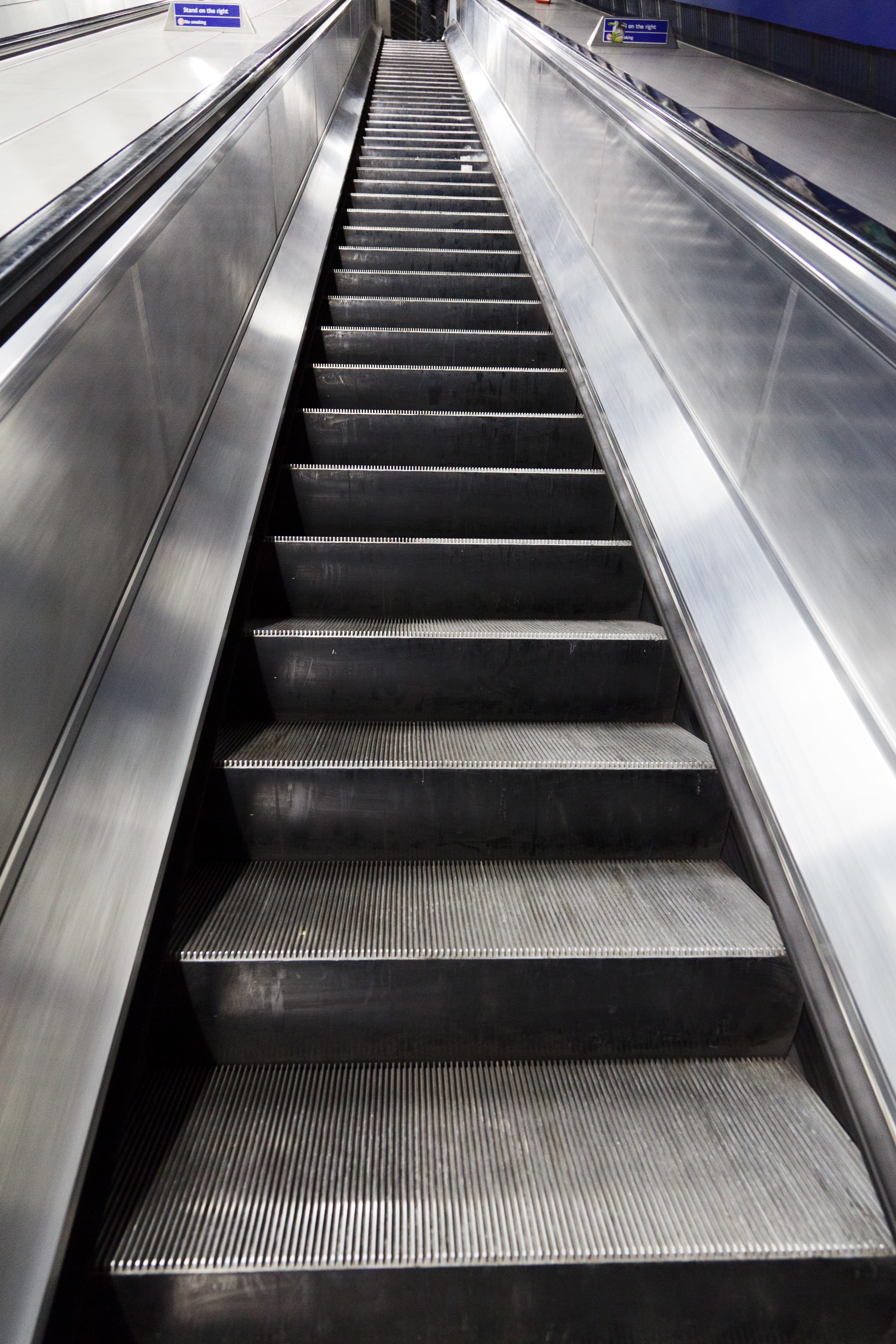 moving walkway, direction, convenience, metal, steps and staircases, railing, transport, black, steel, illuminated, step, transportation, low angle view, Phone HD Wallpaper