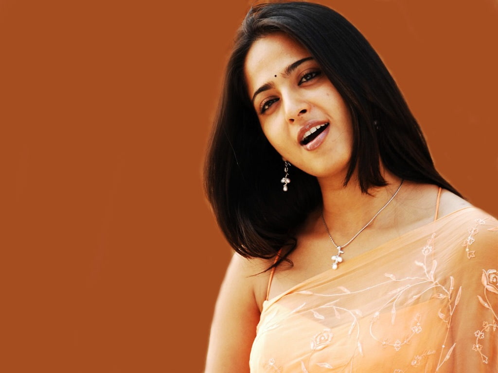 orange background, beautiful woman, beauty, hairstyle, headshot, women, front view, Anushka, hair, young women, one person, Tollywood, indoors, looking at camera, HD Wallpaper