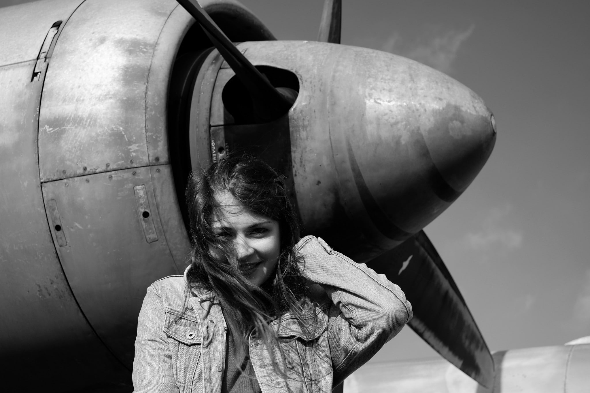 hairstyle, innocence, portrait, 1080P, teenager, standing, headshot, outdoors, lifestyles, one person, day, hair, monochrome women women with planes, real people, HD Wallpaper