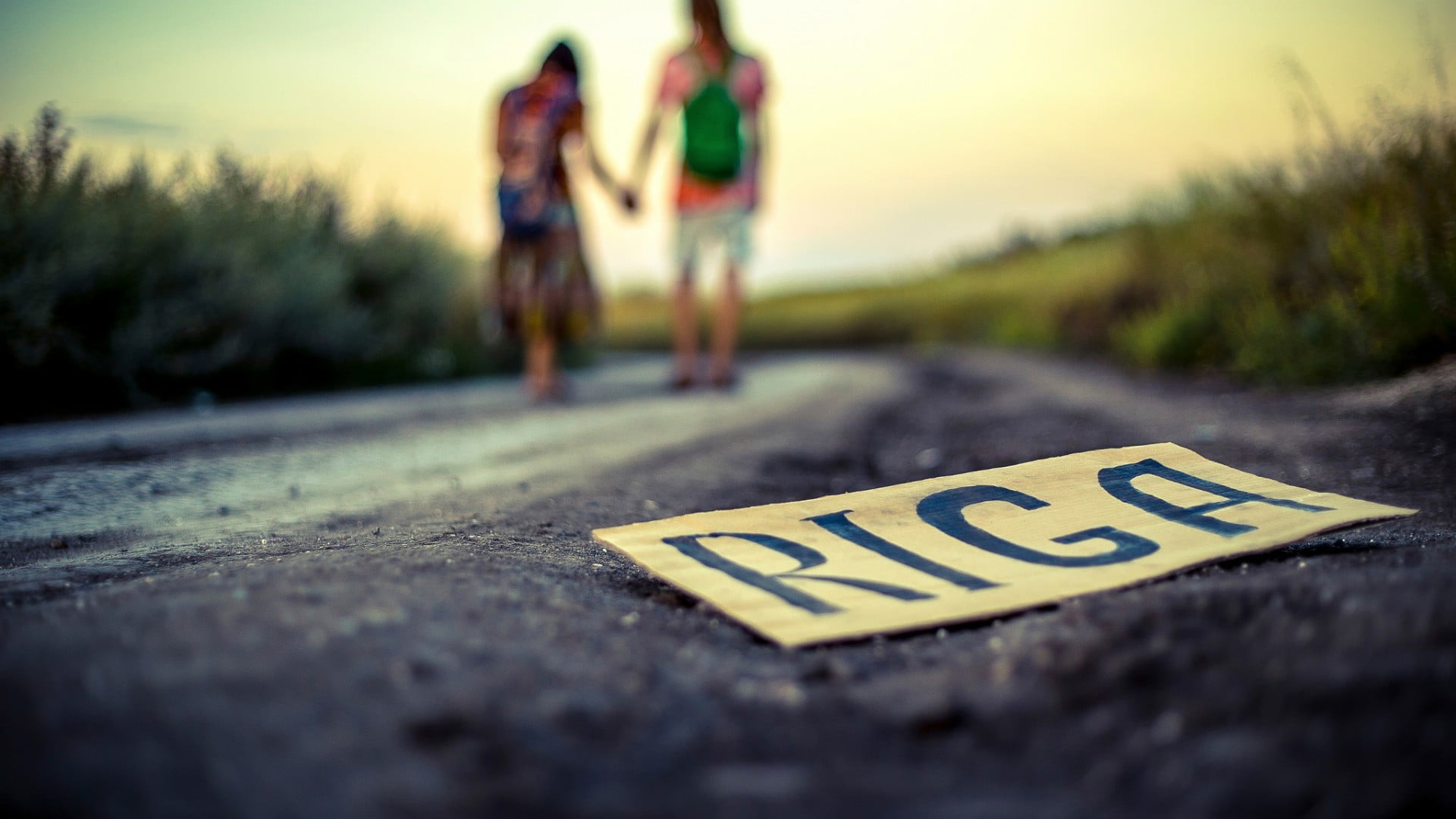 depth of field, signs, symbol, surface level, road sign, sky, western script, communication, walking, road, casual clothing, board, Riga, yellow, white, HD Wallpaper