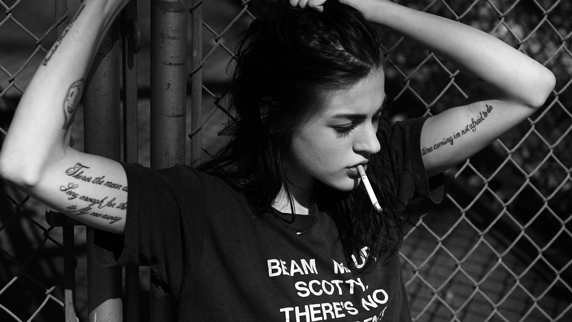young women, emotion, headshot, tattoo, 1080P, fence, monochrome, long hair, young adult, women, hairstyle, adult, text, beauty, casual clothing, waist up, HD Wallpaper