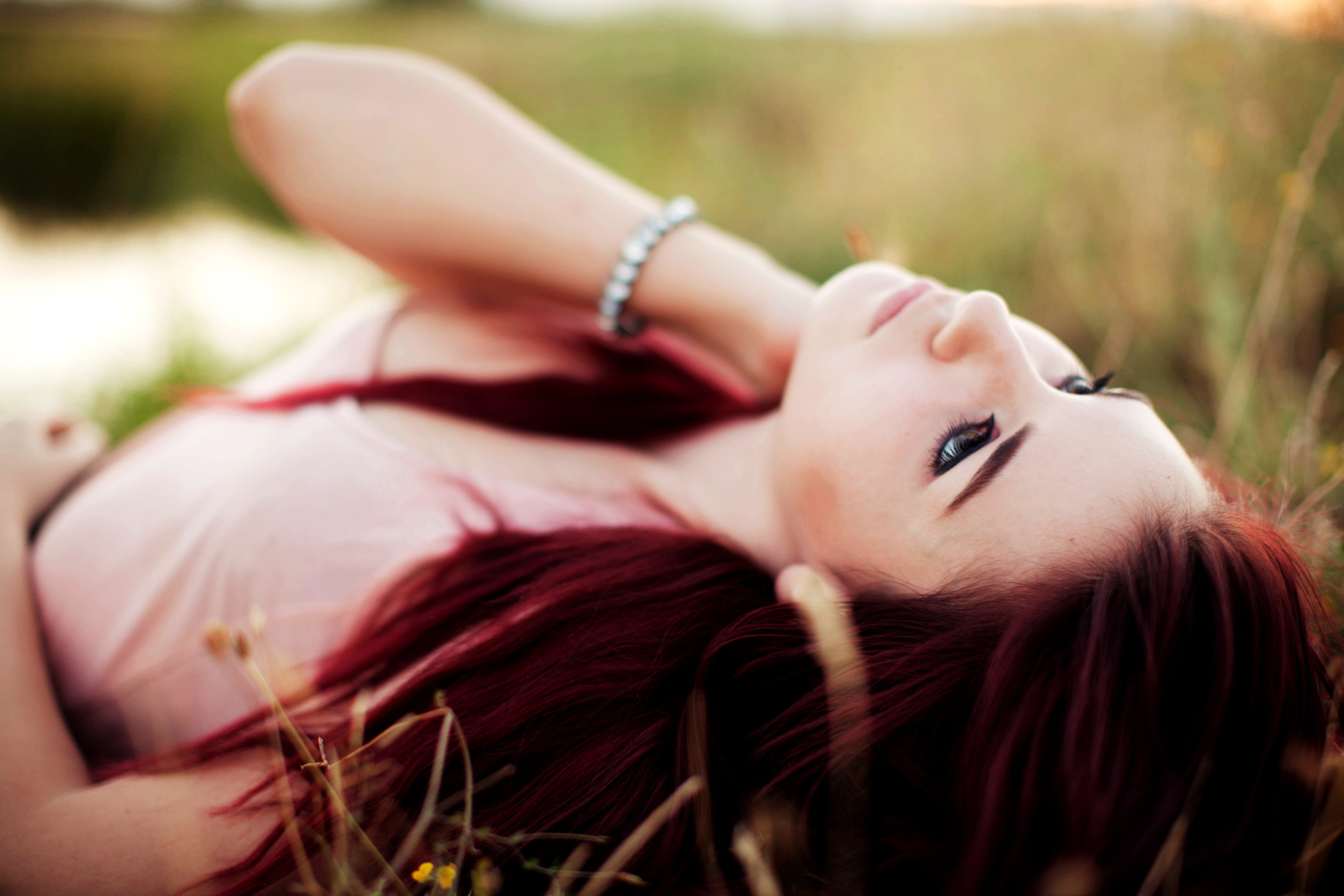 looking up, grass, 5K, beautiful people, Tosha McCarter, face, adult, hair, young adult, day, redhead, lying on back, hairstyle, beautiful woman, headshot, HD Wallpaper