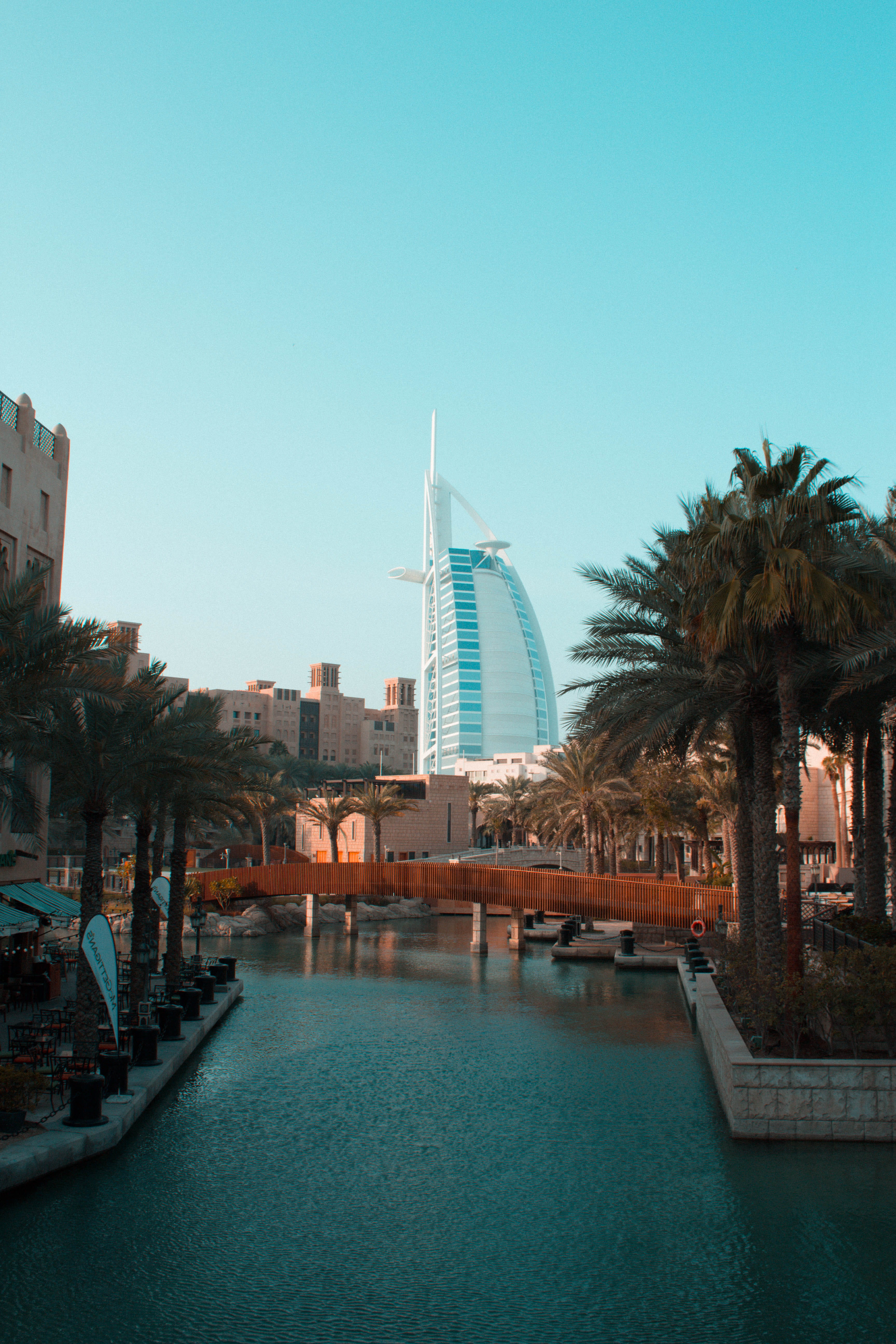 building exterior, outdoors, garden, sky, pool, arecaceae, water, 5K, hotel, luxury, office building, travel destinations, swimming pool, urban, high rise, Phone HD Wallpaper
