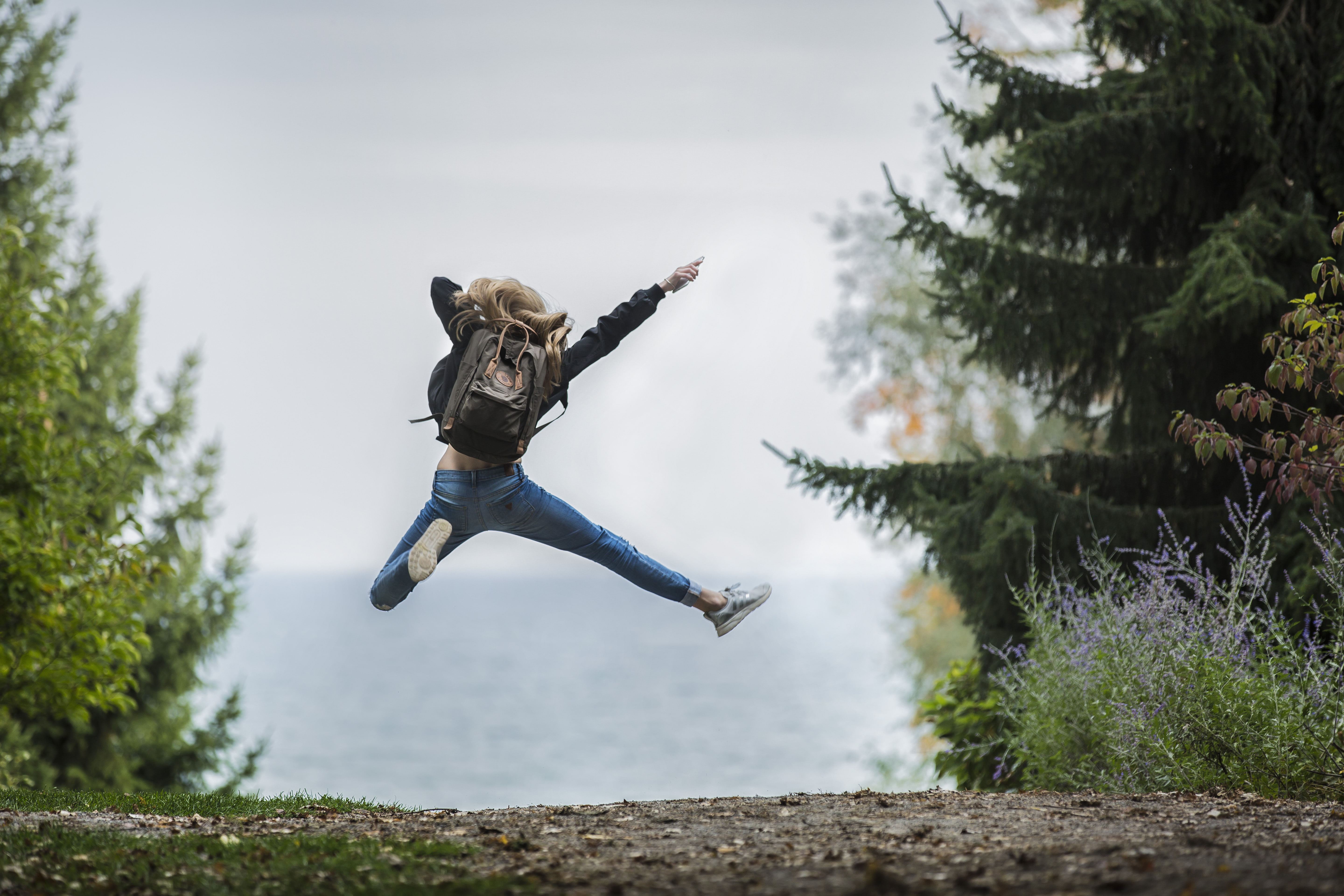 vitality, day, men, emotion, grass, nature, women, landscape, daylight, jumping, positive emotion, real people, freedom, arms outstretched, outdoors, human arm, HD Wallpaper