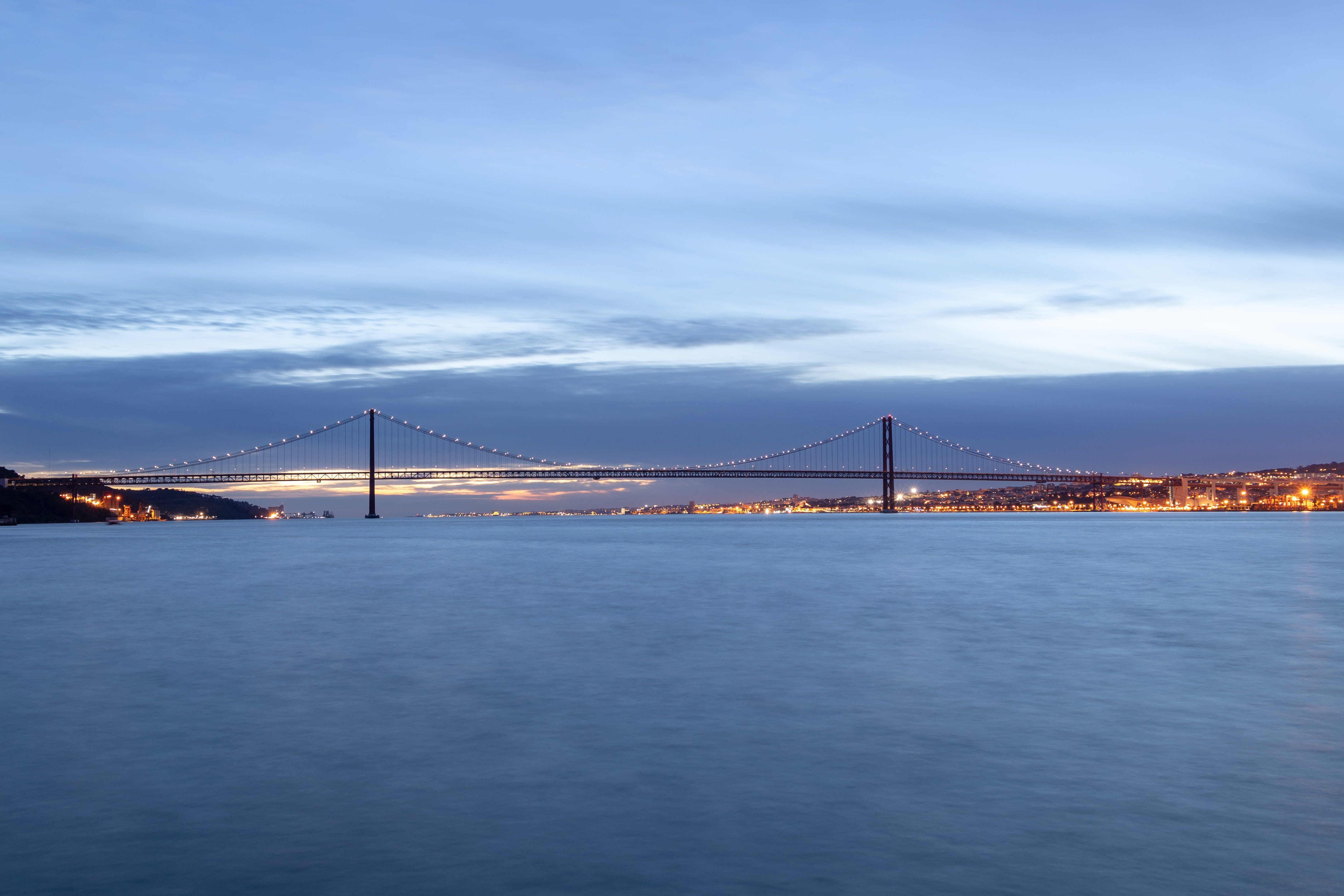 travel, cityscape, travel destinations, 4K, sea, building exterior, nature, illuminated, connection, transportation, tejo, suspension bridge, cloud - sky, HD Wallpaper