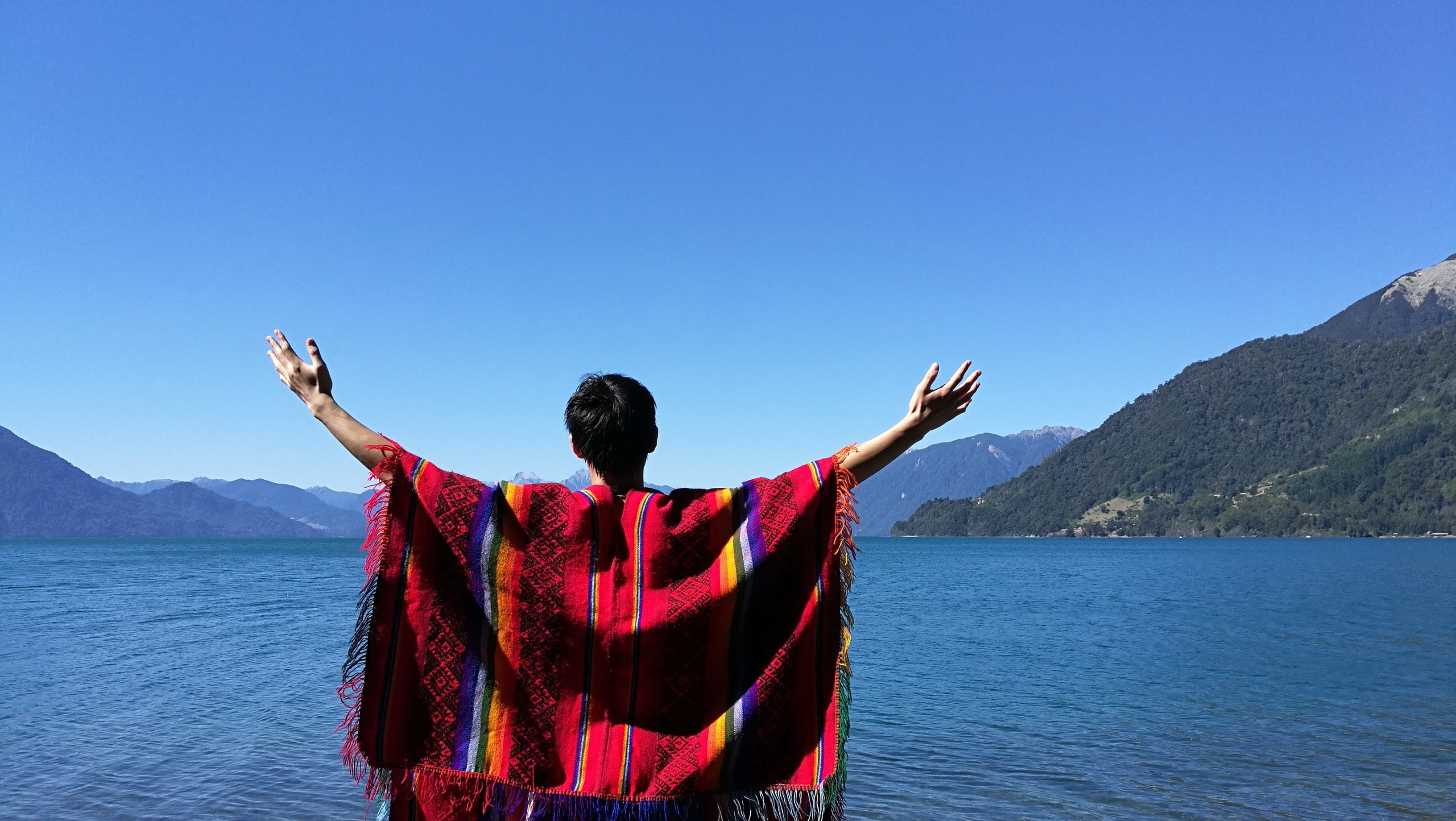 rear View, water, poncho, outdoors, sky, Lake, standing, mountain, two People, front, one Person, human limb, religion, man, people, Todos, women, human arm, HD Wallpaper