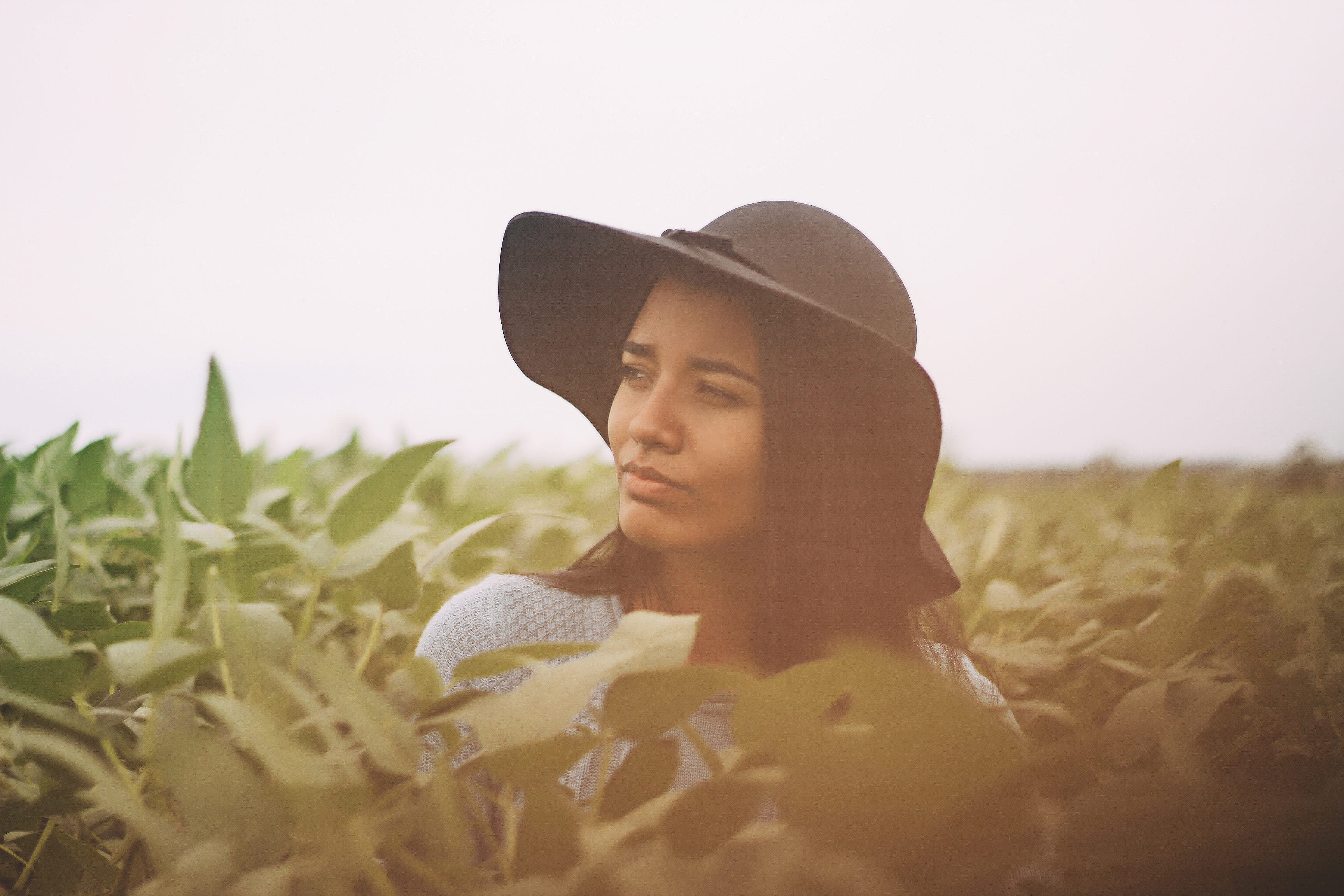 field, person, contemplation, sky, fields, growth, model, brown hat, brunette hair, landscape, beautiful woman, daytime, sunshine, portrait, brown hair, HD Wallpaper