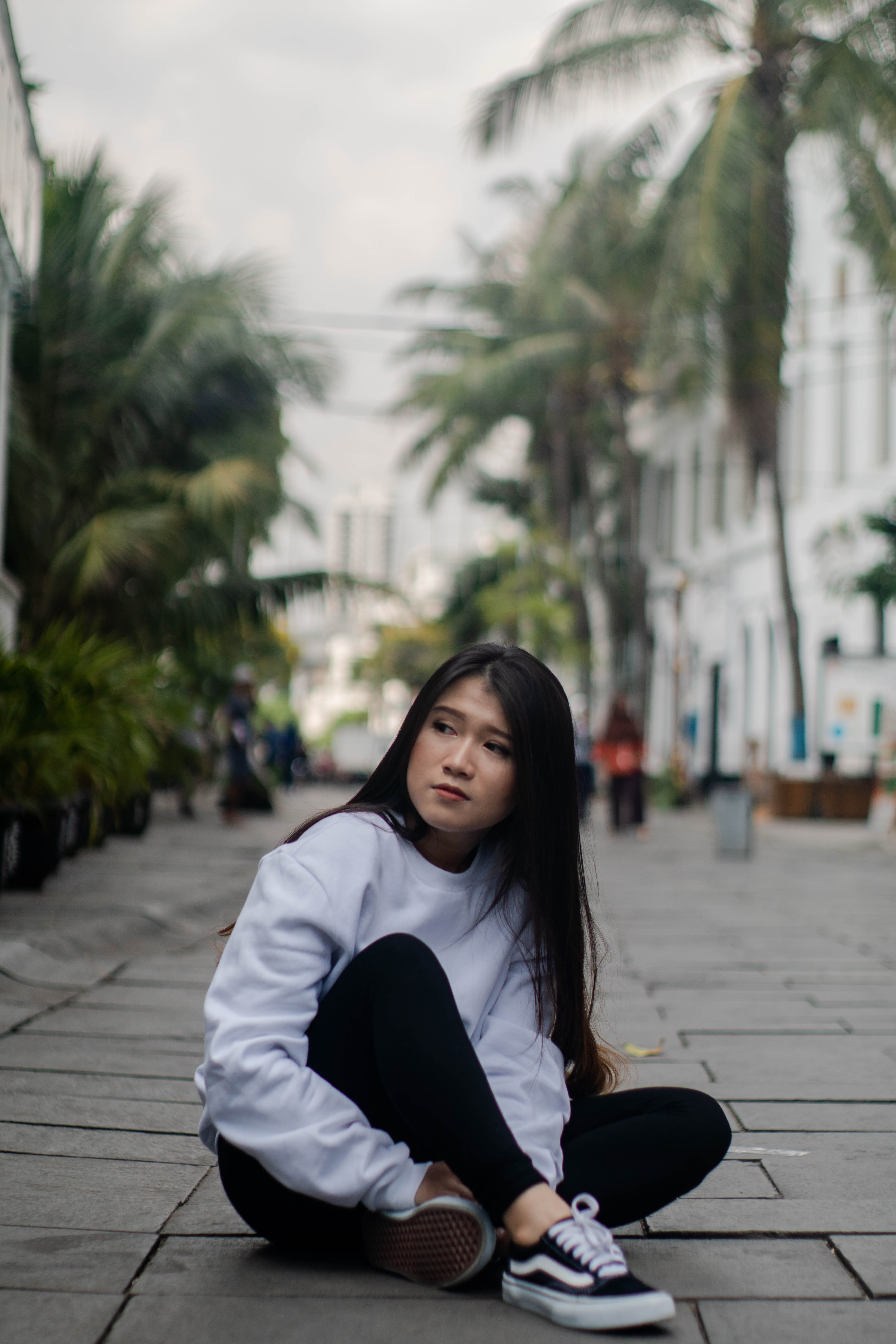 5K, casual clothing, architecture, one person, jakarta, building exterior, sitting, real people, day, leisure activity, outfit, looking at camera, young adult, Phone HD Wallpaper