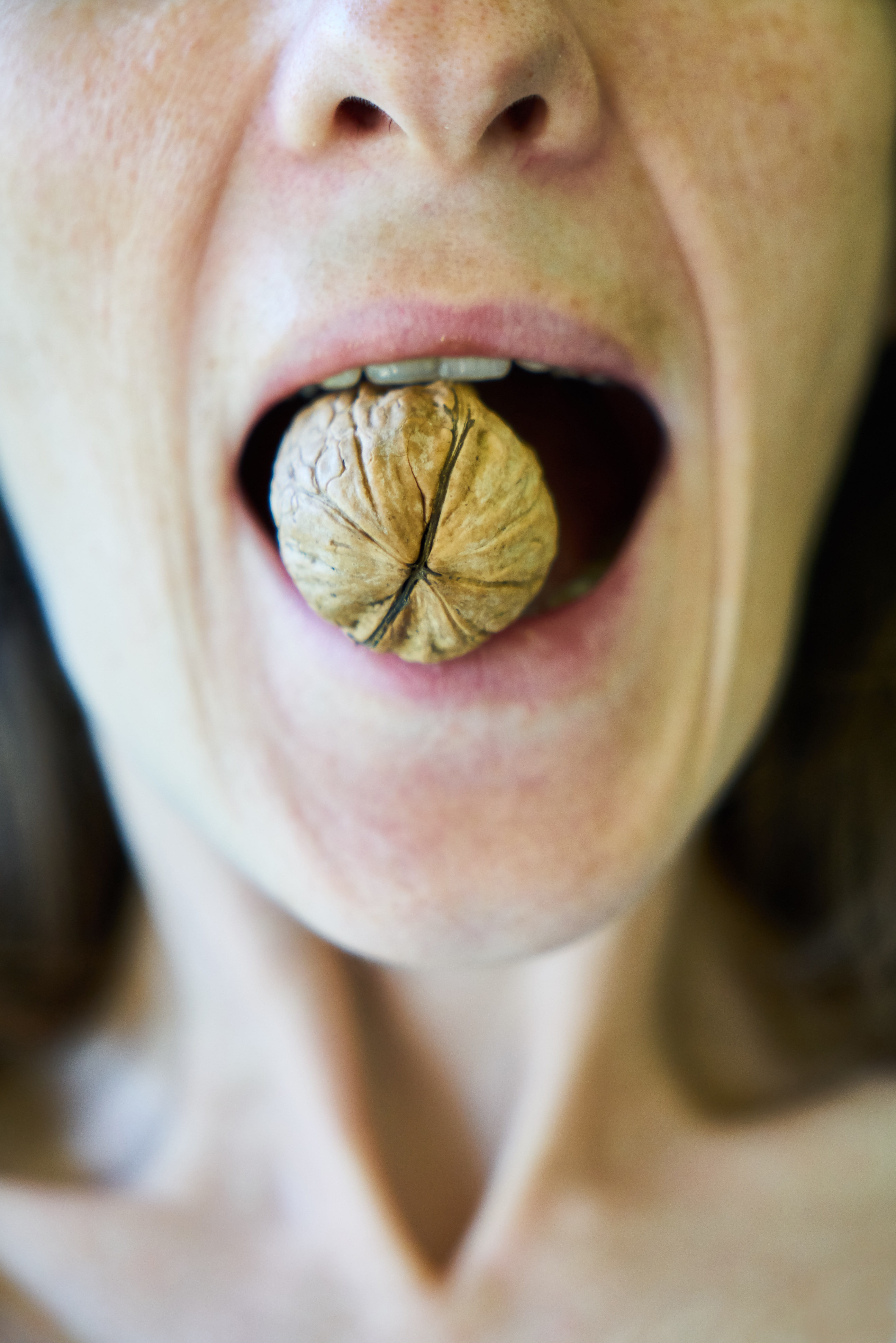 body part, food, human face, mouth, close-up, sarmiento, human mouth, woman, kitchen, walnut, shelled, model, young, indoors, front view, one person, portrait, Phone HD Wallpaper
