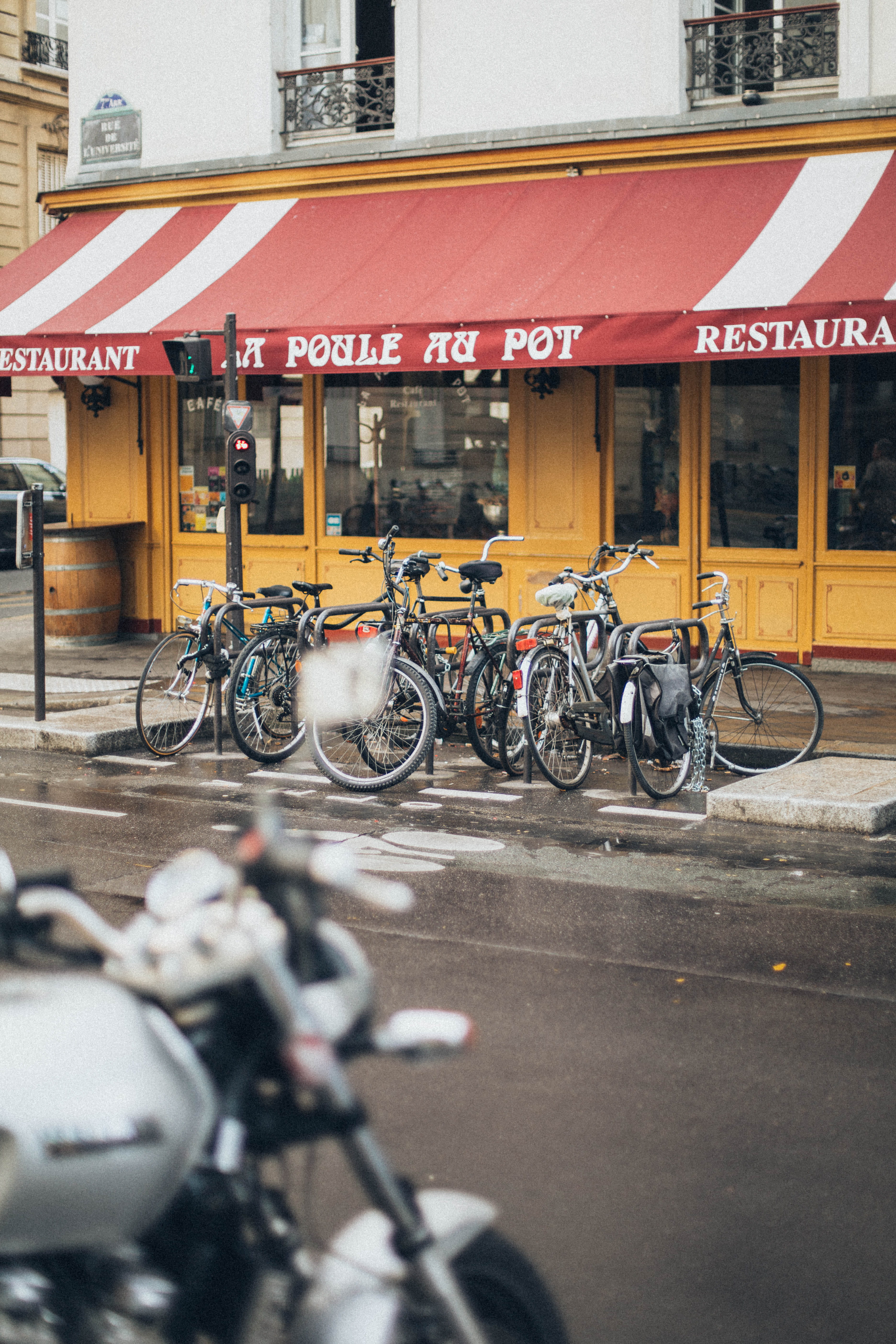 bicycles, parked, front, built structure, no people, 5K, stationary, city, bikes, buildings, transportation, building, bicycle, outdoors, road, text, commerce, Phone HD Wallpaper