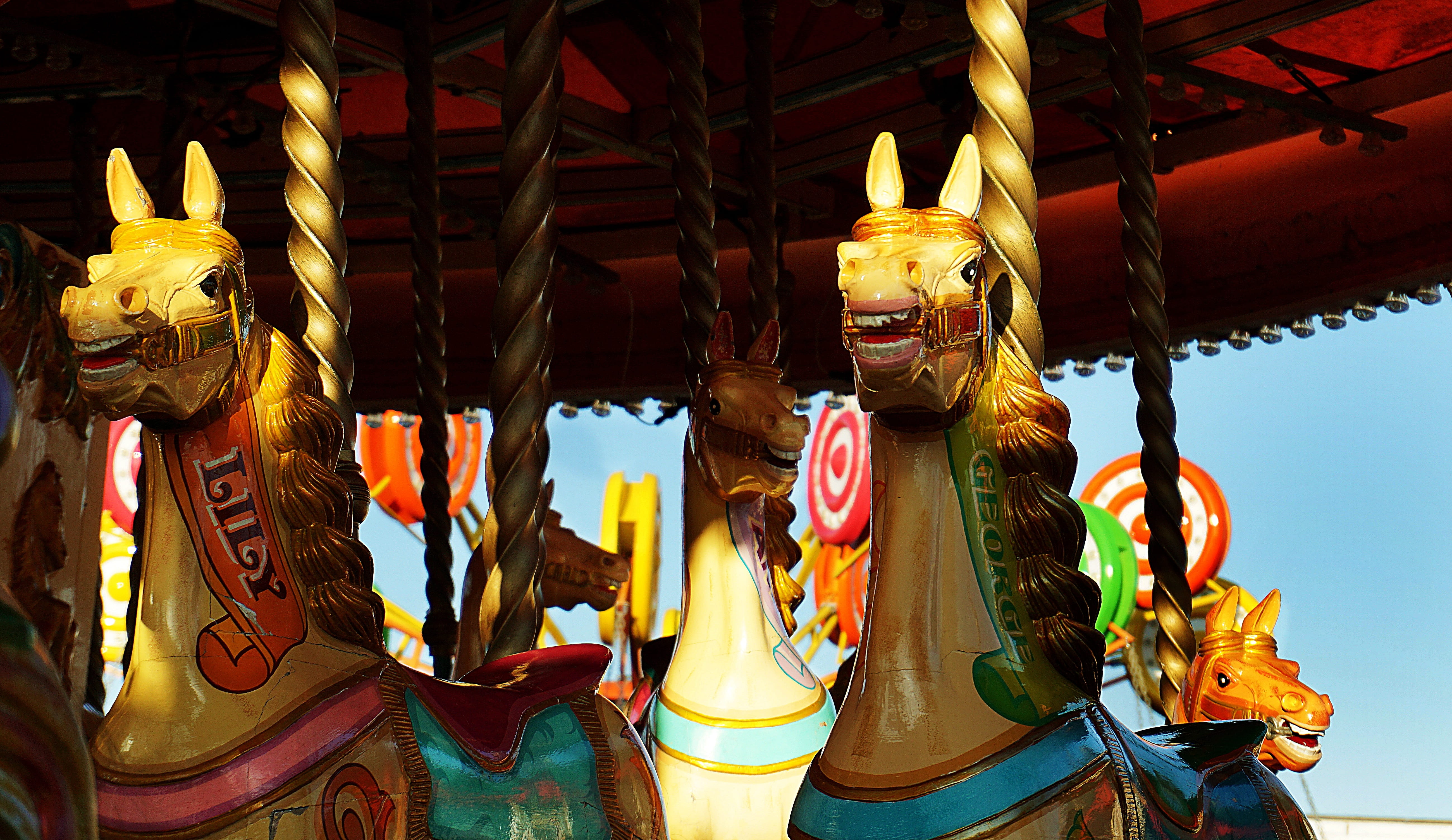 fun, fairground, statue, religion, male likeness, 5K, carousel, belief, day, horses, horse, outdoors, fairground ride, ornate, place of worship, arts culture and entertainment, HD Wallpaper