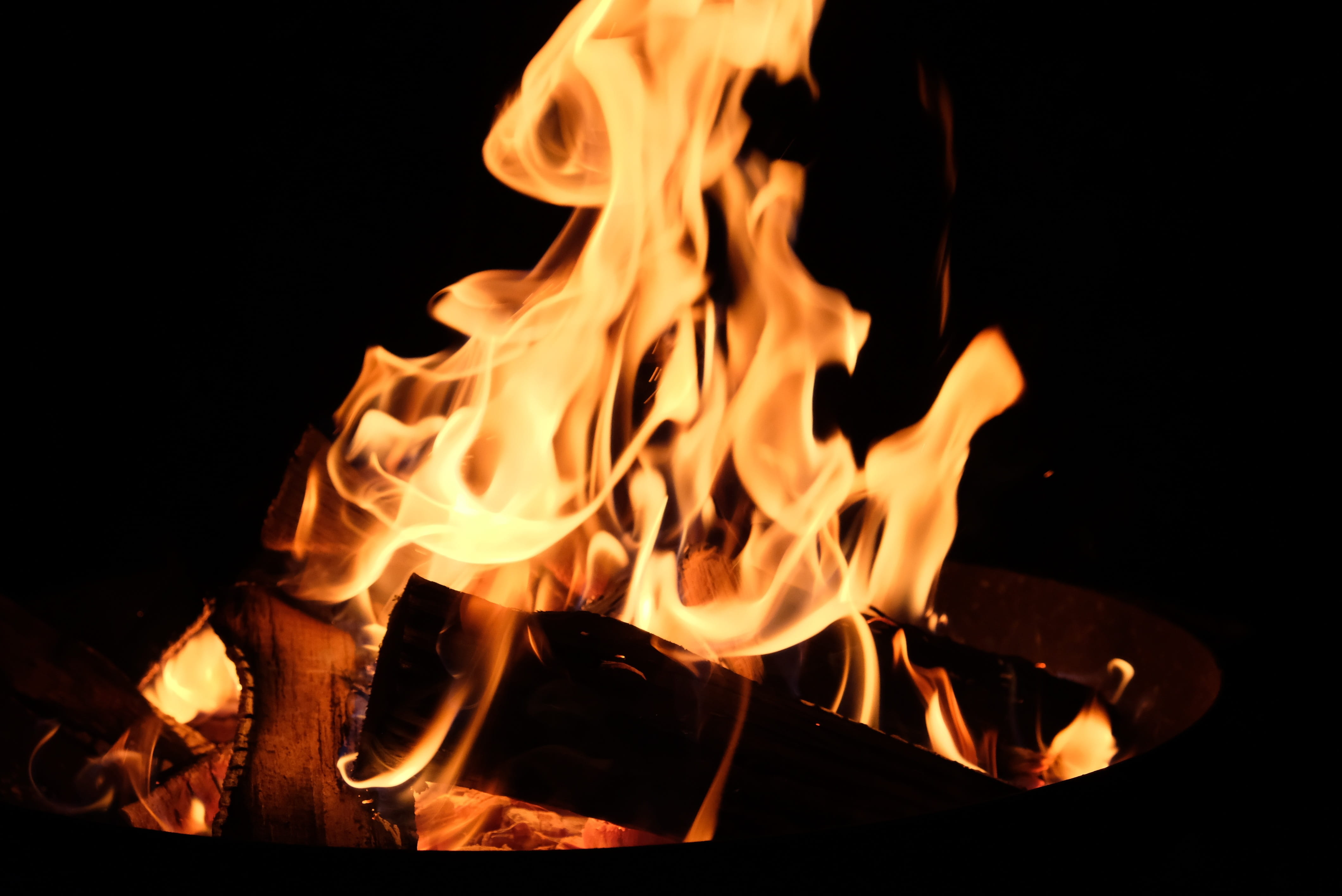 fireplace, performance, matrix code, orange color, portrait, heat - temperature, yellow, firewood, black background, light, celebrate, flame, matrix, man, HD Wallpaper