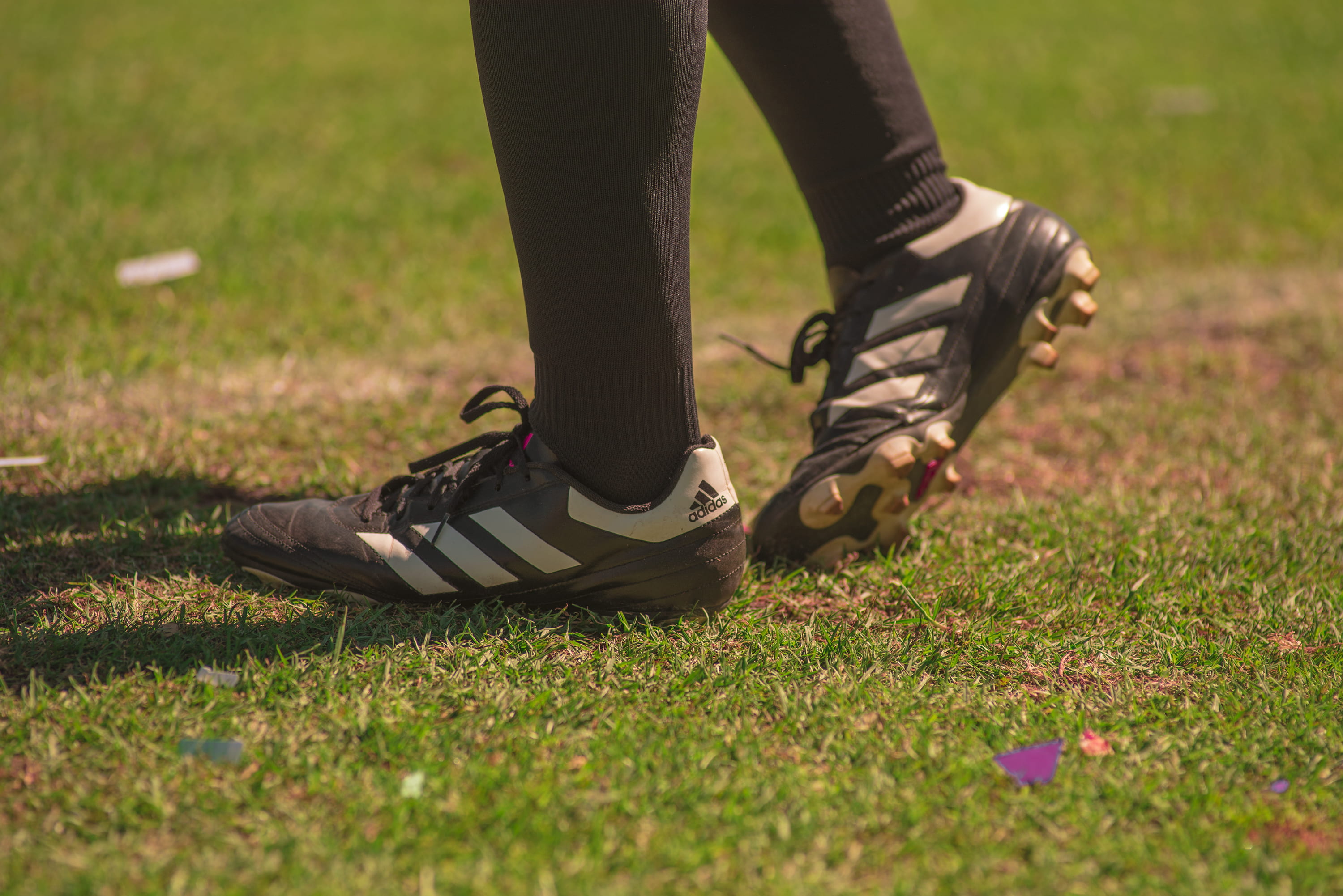 human body part, grass, black, standing, one person, shoe, selective focus, lifestyles, gray, adidas, human leg, adult, person, wearing, nature, day, plant, HD Wallpaper