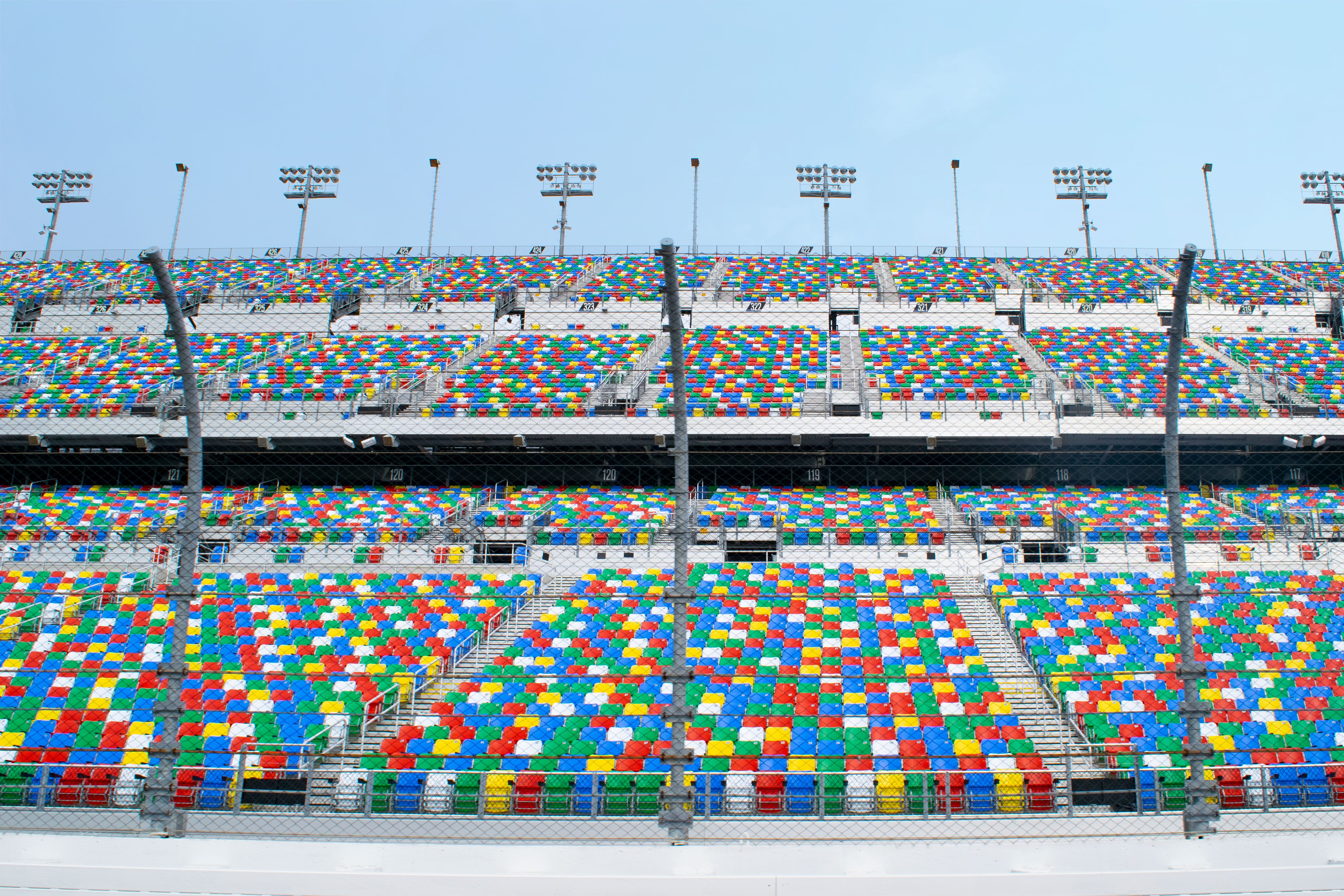 architecture, nascar, protection, high angle view, in a row, outdoor, large group of objects, multi colored, empty, speed, built structure, safety, choice, HD Wallpaper