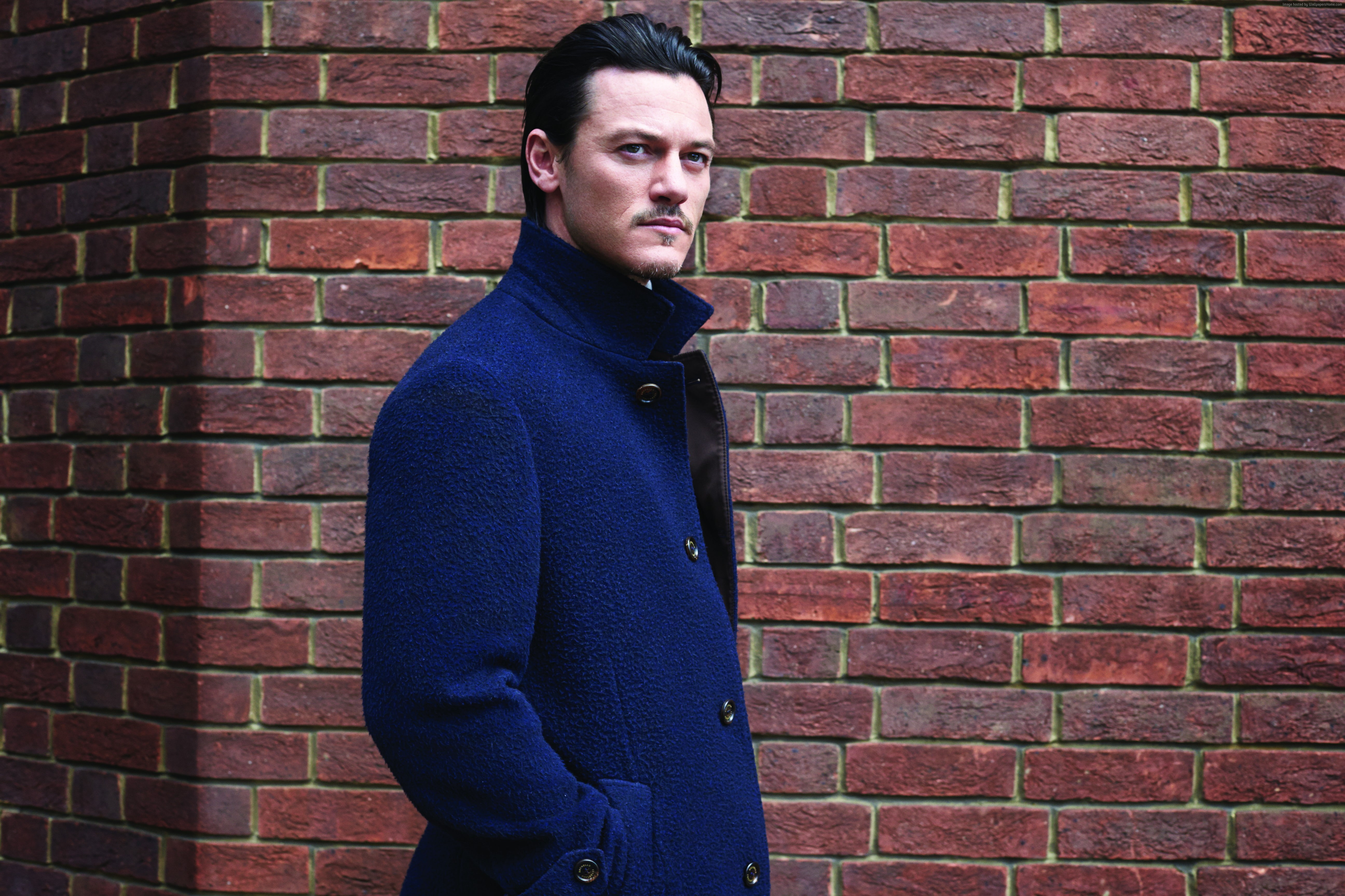 Actor, blue cloak, 5K, Luke Evans, look, brick wall, HD Wallpaper