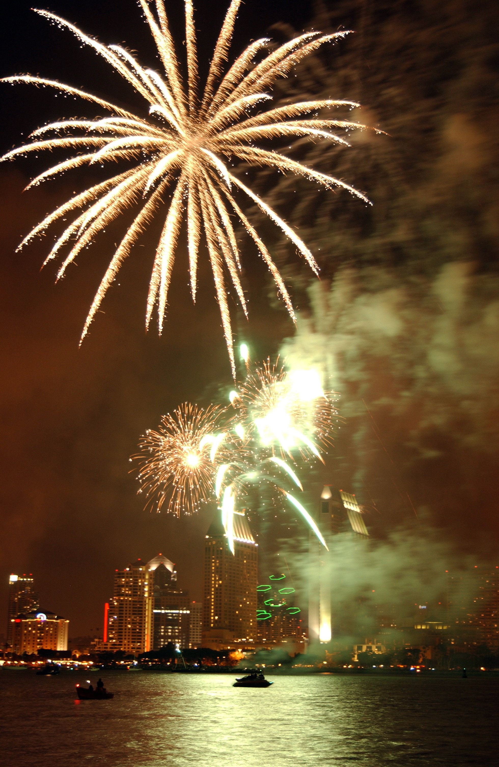 firework, no people, beautiful, building exterior, exploding, city, buildings, celebration, lights, boats, water, long exposure, night, firework - man made object, Phone HD Wallpaper