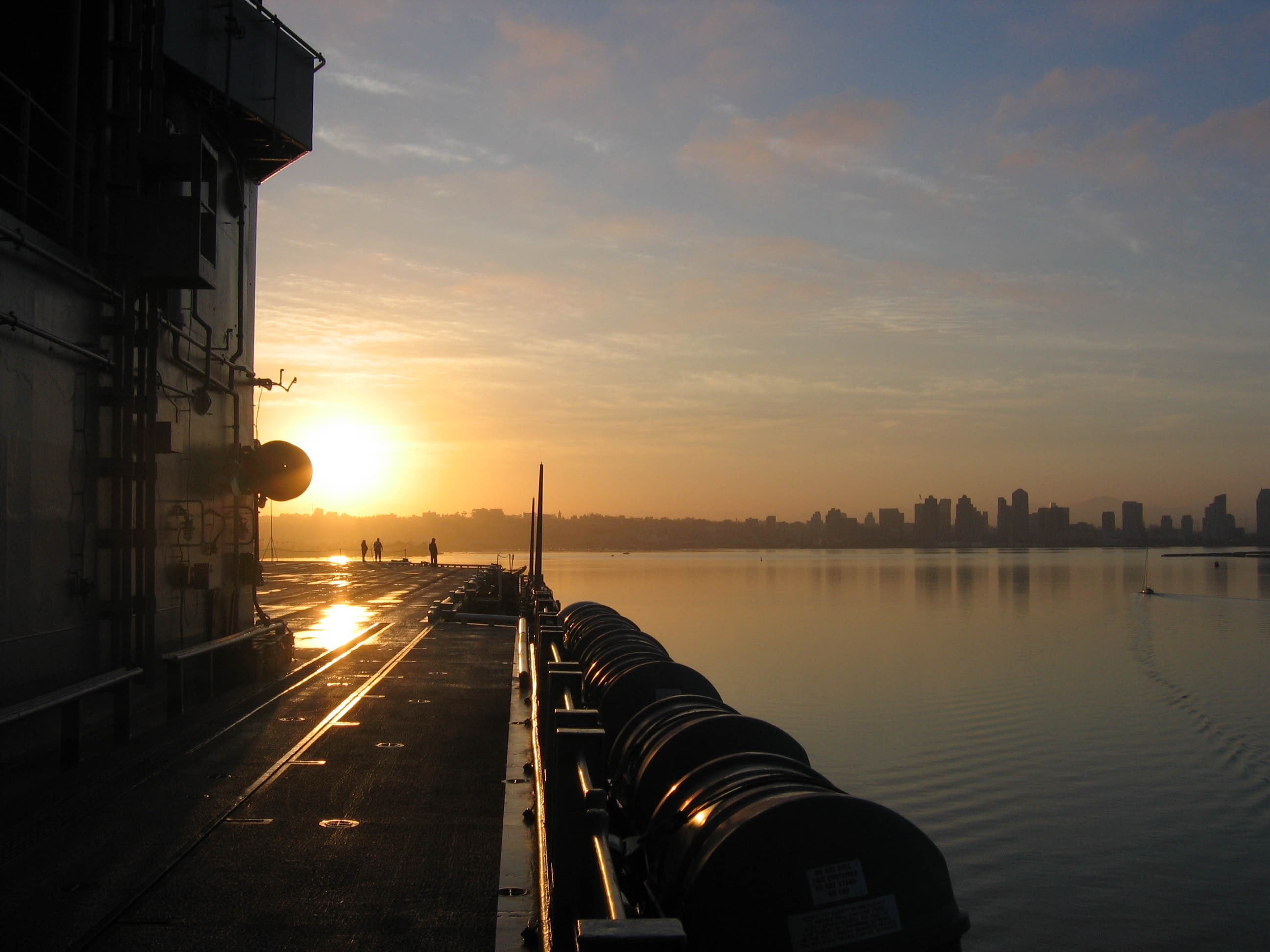 sunset, tranquil scene, sun, bay, military, reflection, buildings, reflections, sea, clouds, skyline, built structure, navy, outside, ship, no people, cities, HD Wallpaper