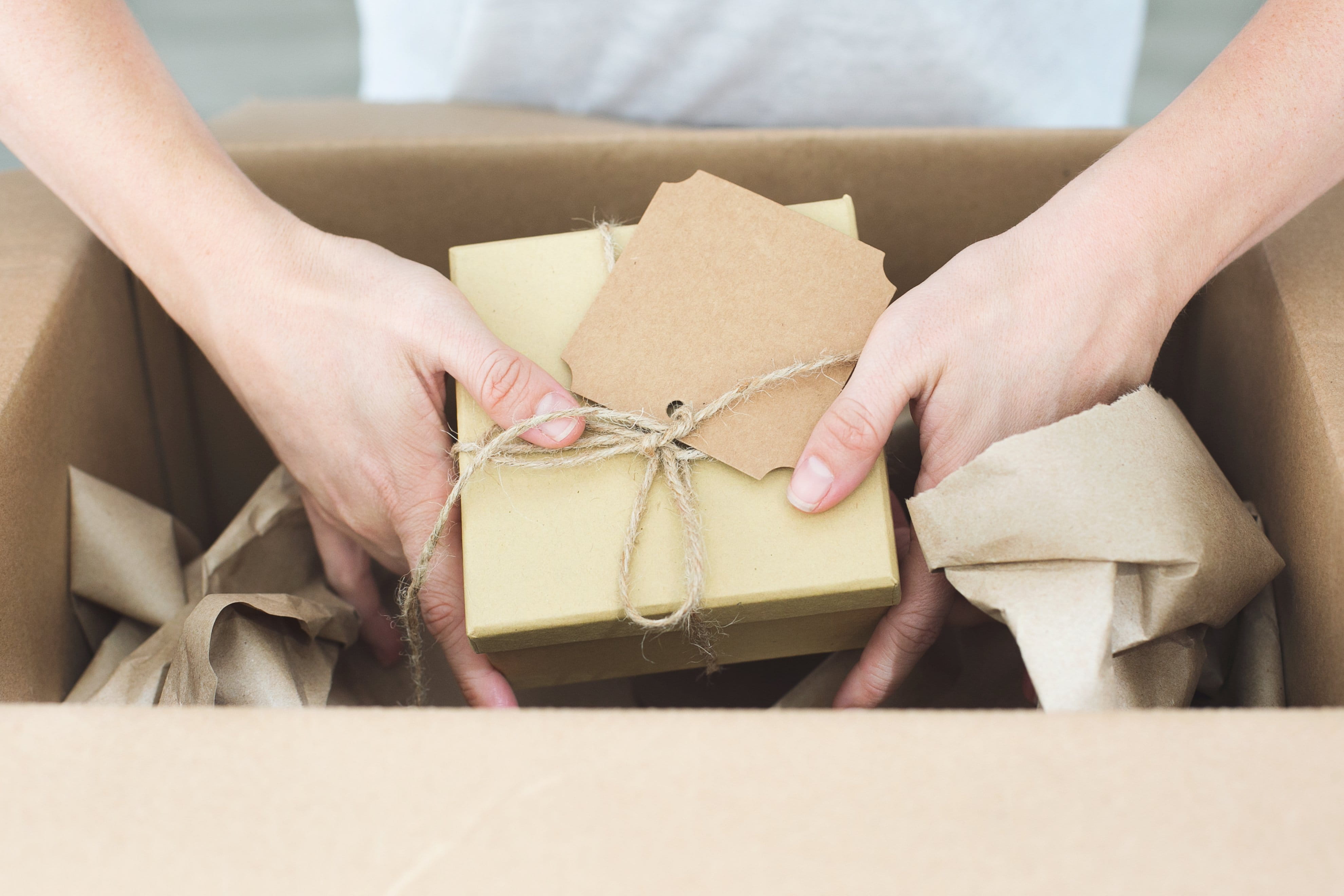 indoors, one person, Gifts, tied bow, 4K, paper, packing, brown, Box, photo, women, hand, close-up, bow, Shipping, holding, gift, box - container, human body part, HD Wallpaper