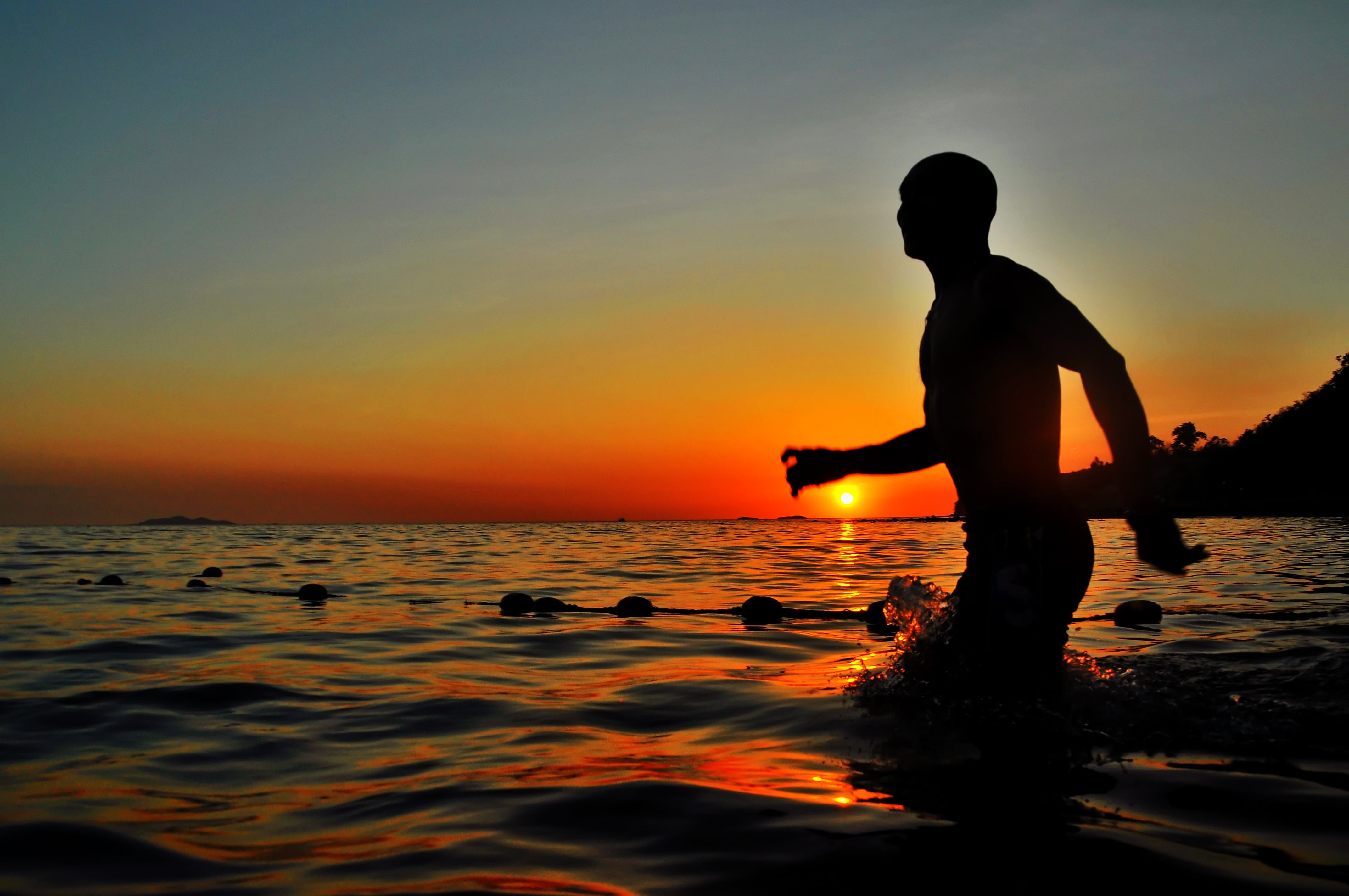 cloud, men, waterfront, one person, idyllic, people, man, silhouette, body, beauty in nature, back lit, leisure activity, beach, swimming, sunlight, horizon over water, HD Wallpaper