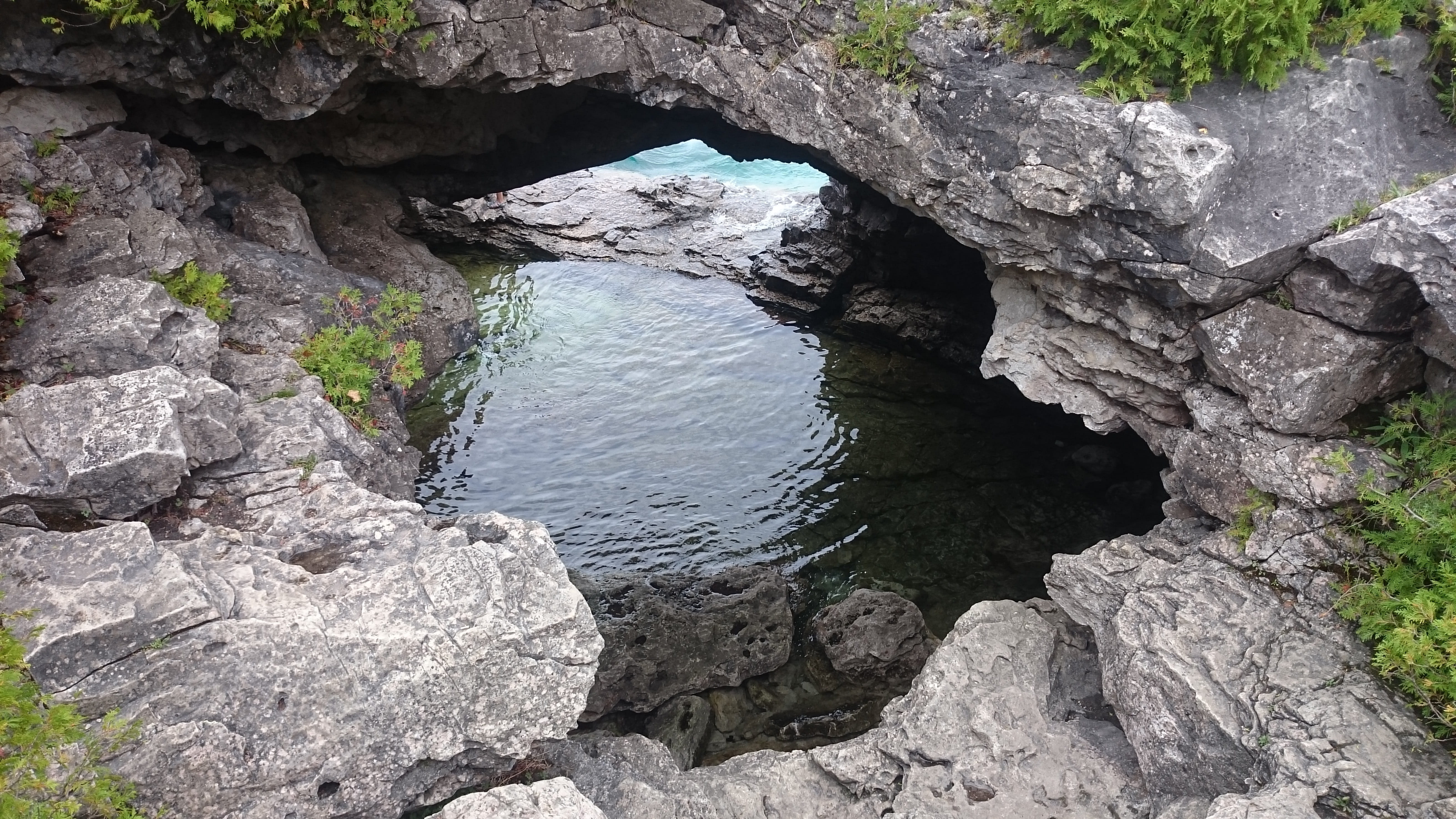 cave, tranquil scene, lake, tobermory, eroded, land, sunlight, landscape, canada, rock, non-urban scene, beauty in nature, plant, water, grotto, tranquility, HD Wallpaper