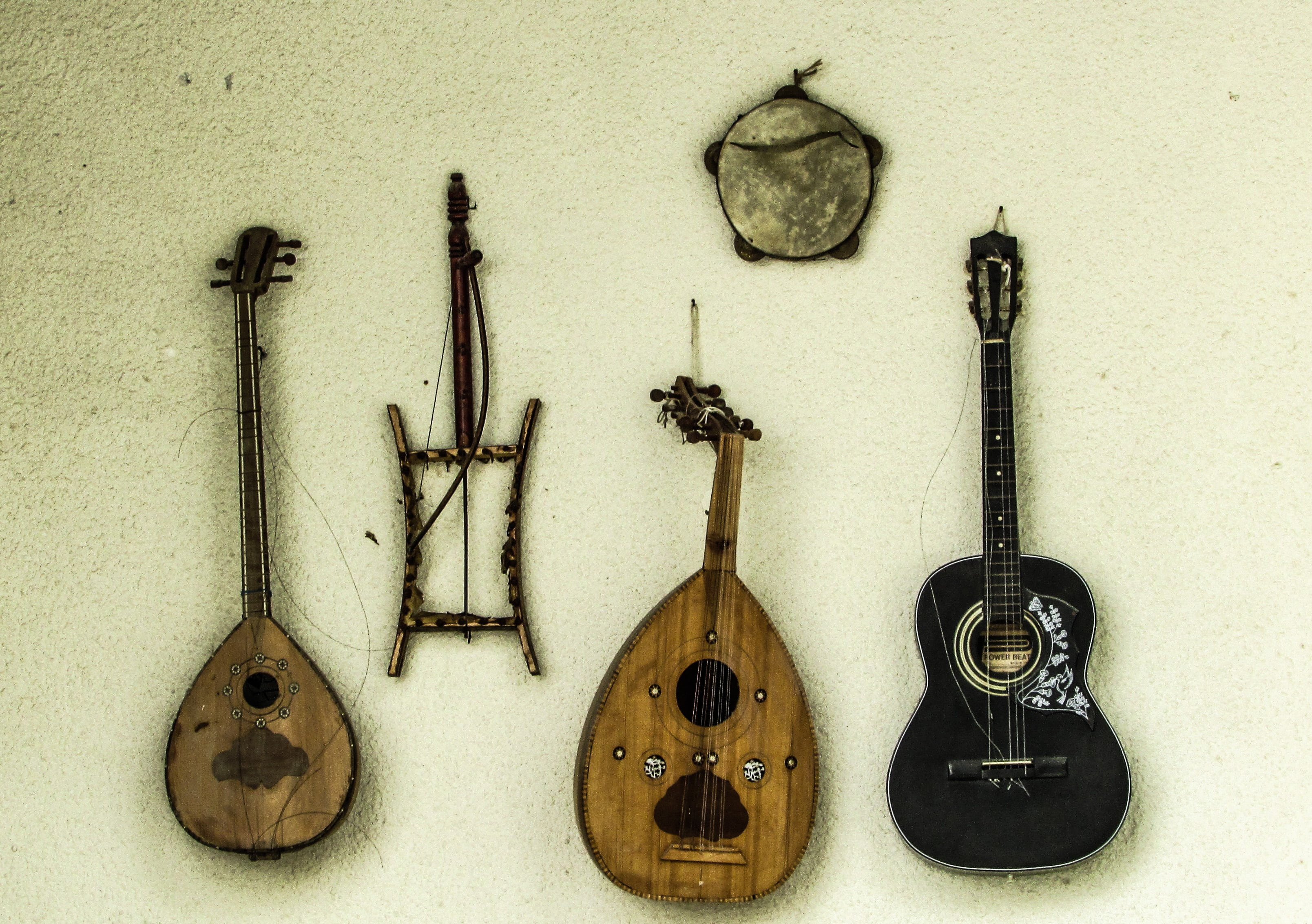 black, tabor, brown, directly above, still life, ukulele, group of objects, arts culture and entertainment, string instrument, choice, two, wall - building feature, HD Wallpaper