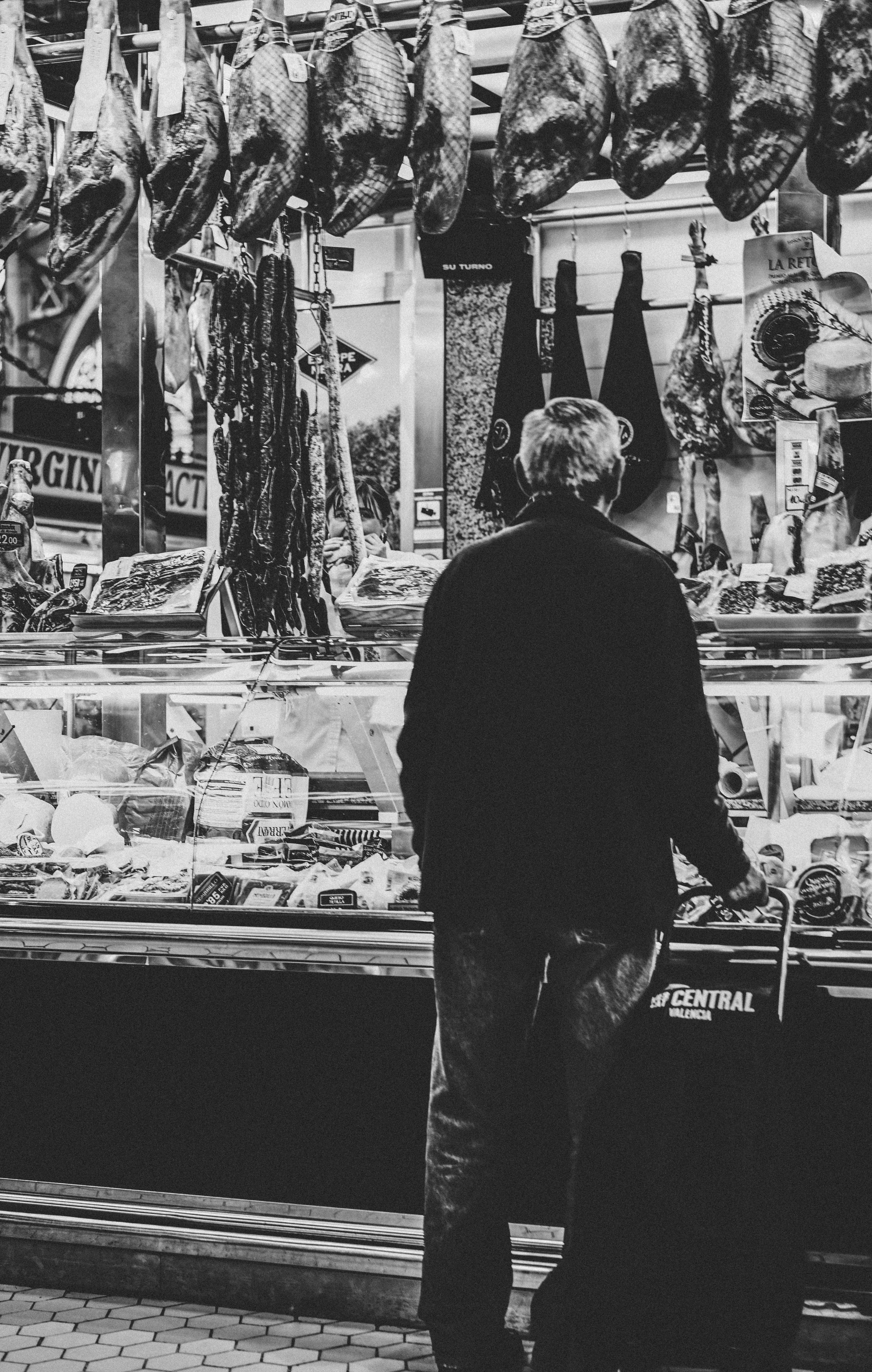 arcade game machine, people, newsstand, silhouette, bazaar, casual clothing, person, city, jewelry store, leisure activities, apparel, advertisement, inside, Phone HD Wallpaper