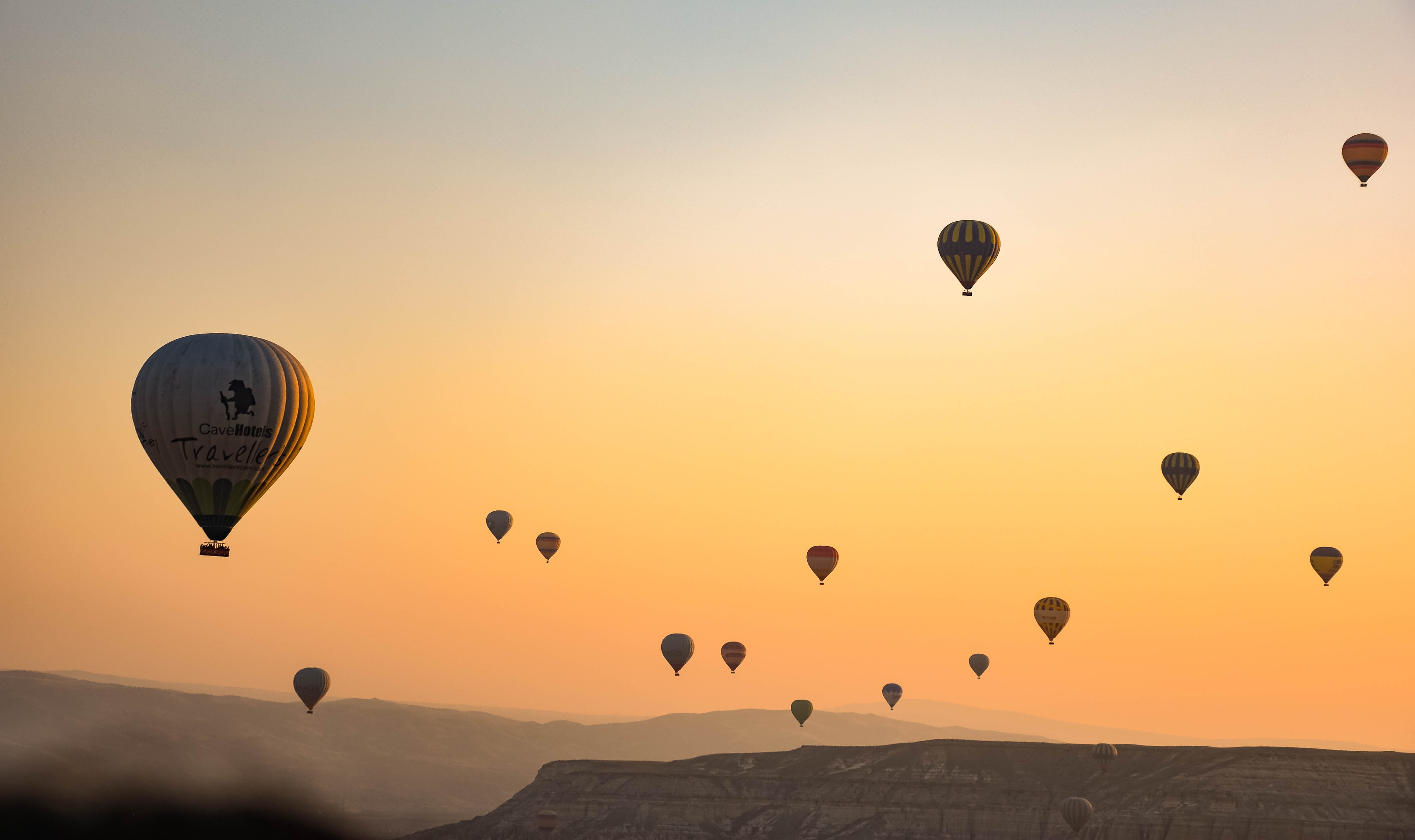 mountains, sun, unesco, orange color, travel, sunset, colorful, hot, balloon, attraction, ballooning festival, beauty in nature, turkey, air vehicle, flying, HD Wallpaper