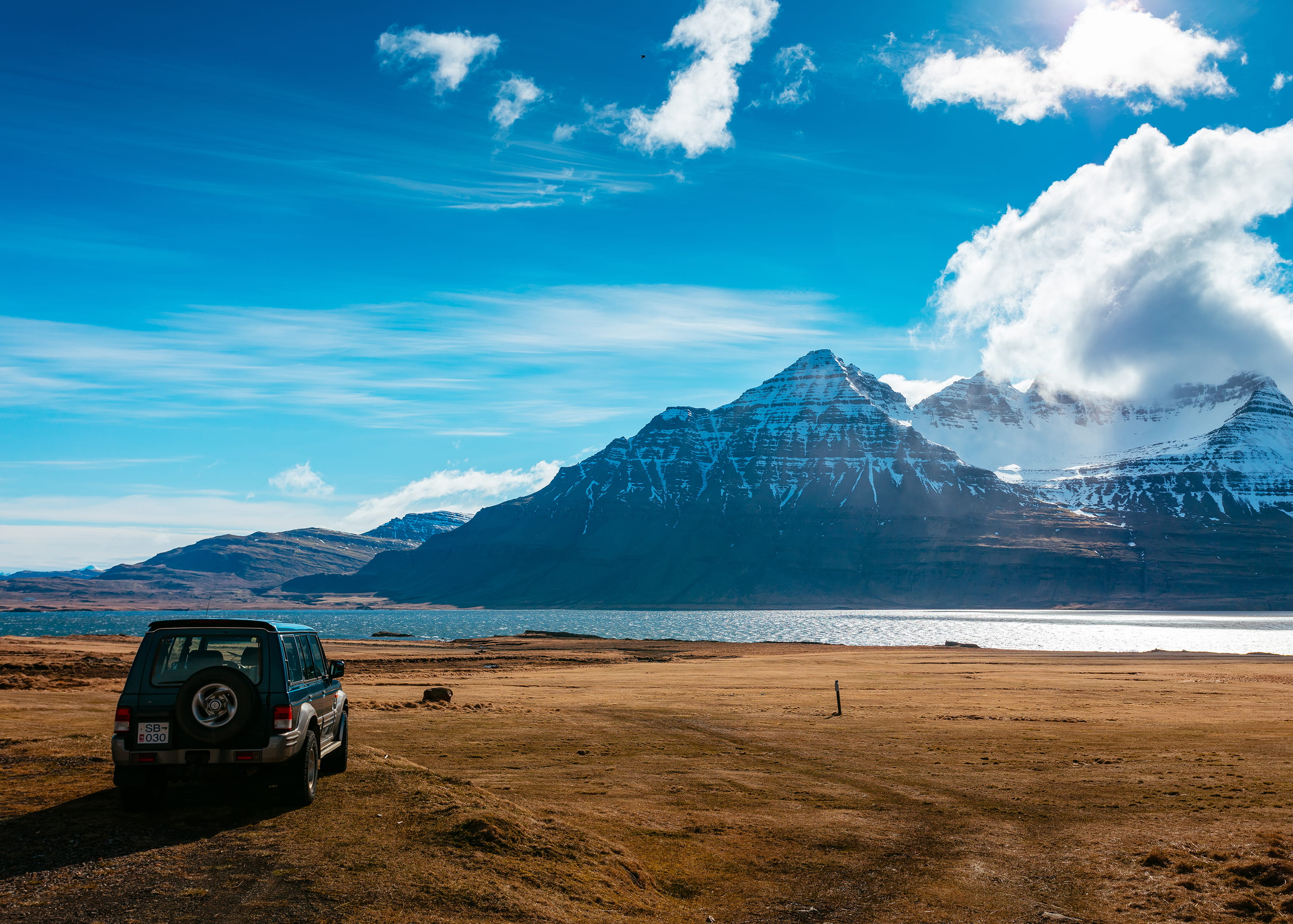mountain, brown, jeep, cloud - Sky, parking, mountain Range, road, travel Destinations, car, land, dirt Road, extreme Terrain, tranquil scene, mountain Peak, HD Wallpaper