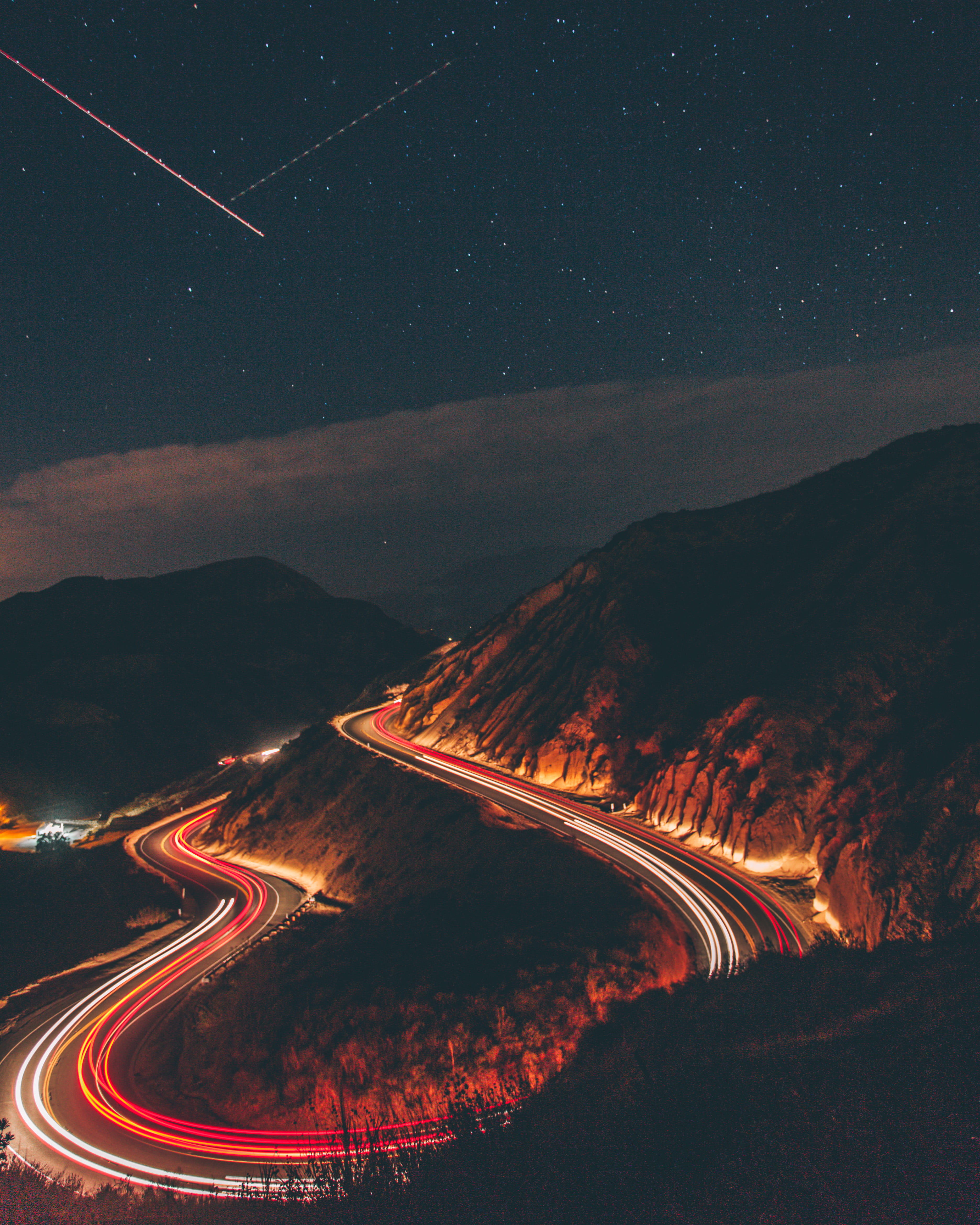 mountain, light trails, car lights, transportation system, nightscape, transportation, red, black, 4K, buildings, space, night, winding road, painting, Phone HD Wallpaper