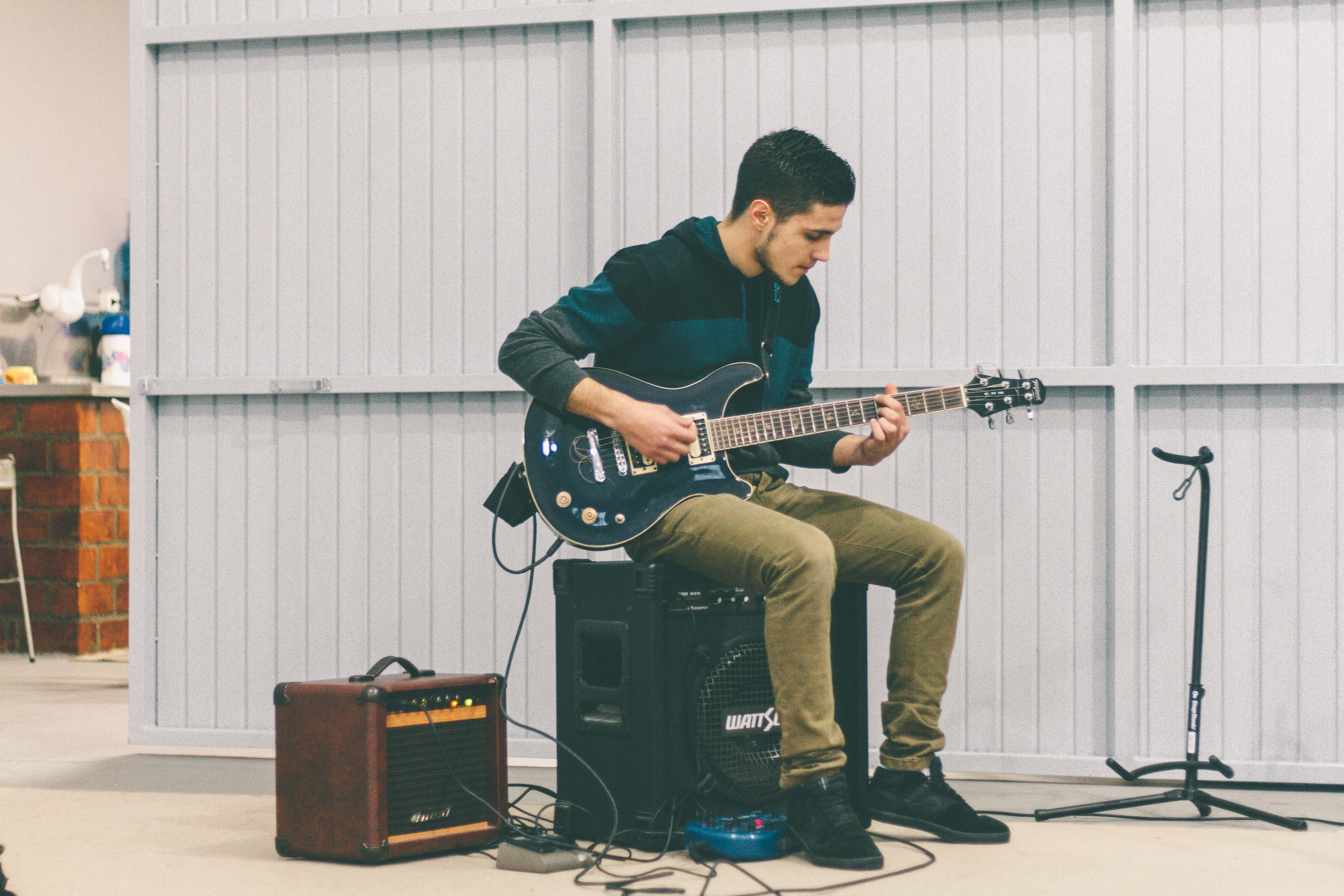 musical equipment, musical instrument, adult, playing, electric guitar, young men, acoustic guitar, daytime, man, artist, speaker, male, musician, men, HD Wallpaper