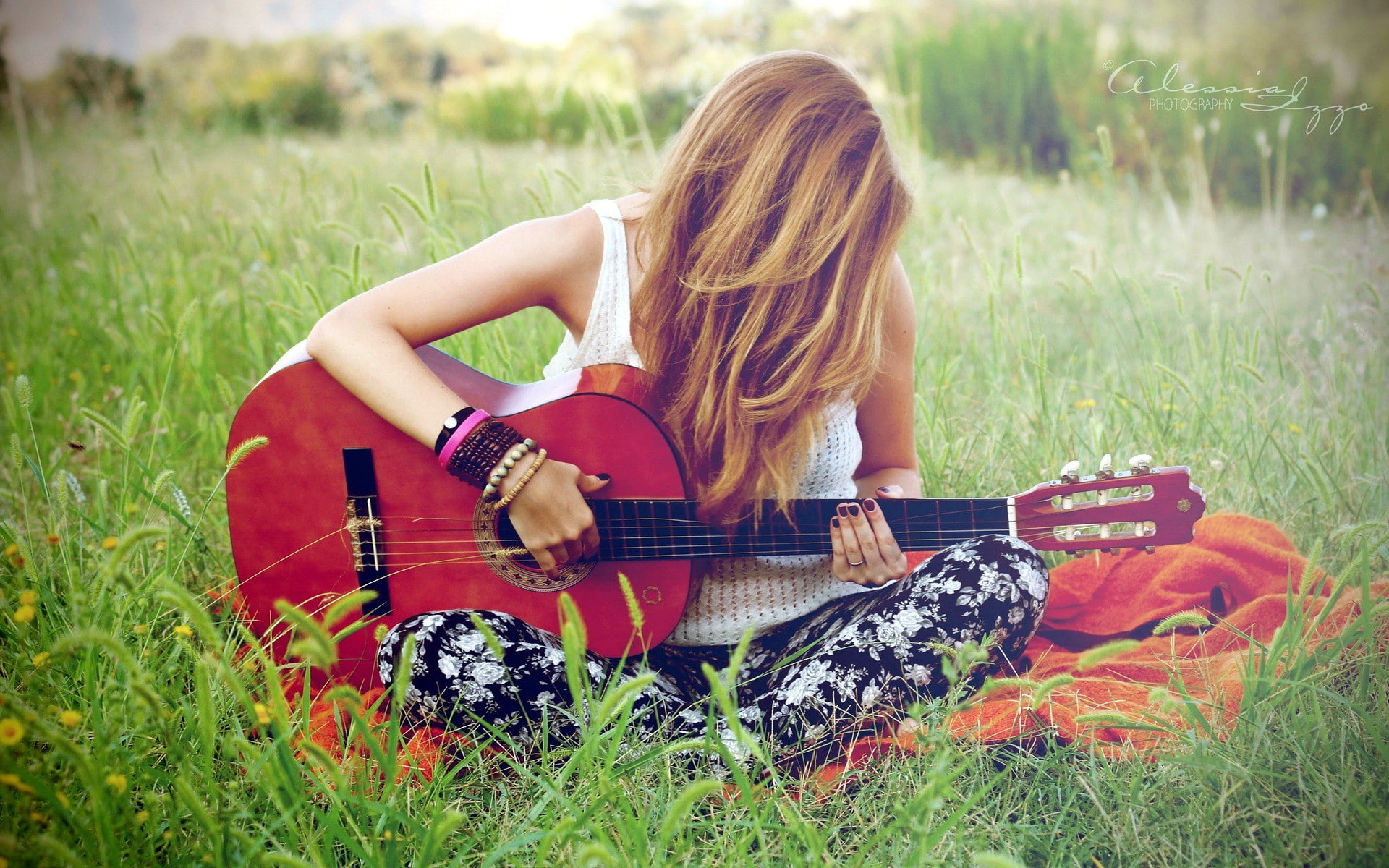 string instrument, plucking an instrument, nature, hairstyle, casual clothing, plant, field, model, music, grass, guitar, playing, acoustic guitar, arts culture and entertainment, HD Wallpaper